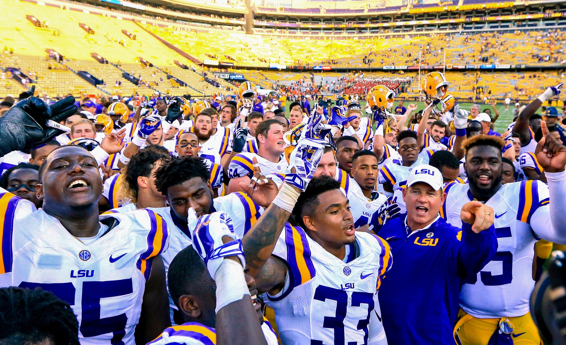 Sep 19, 2015; Baton Rouge, LA, USA; LSU Tigers head coach Les Miles and players celebrate following a win against the Auburn Tigers in a game at Tiger Stadium. LSU defeated Auburn 45-21. Mandatory Credit: Derick E. Hingle-USA TODAY Sports