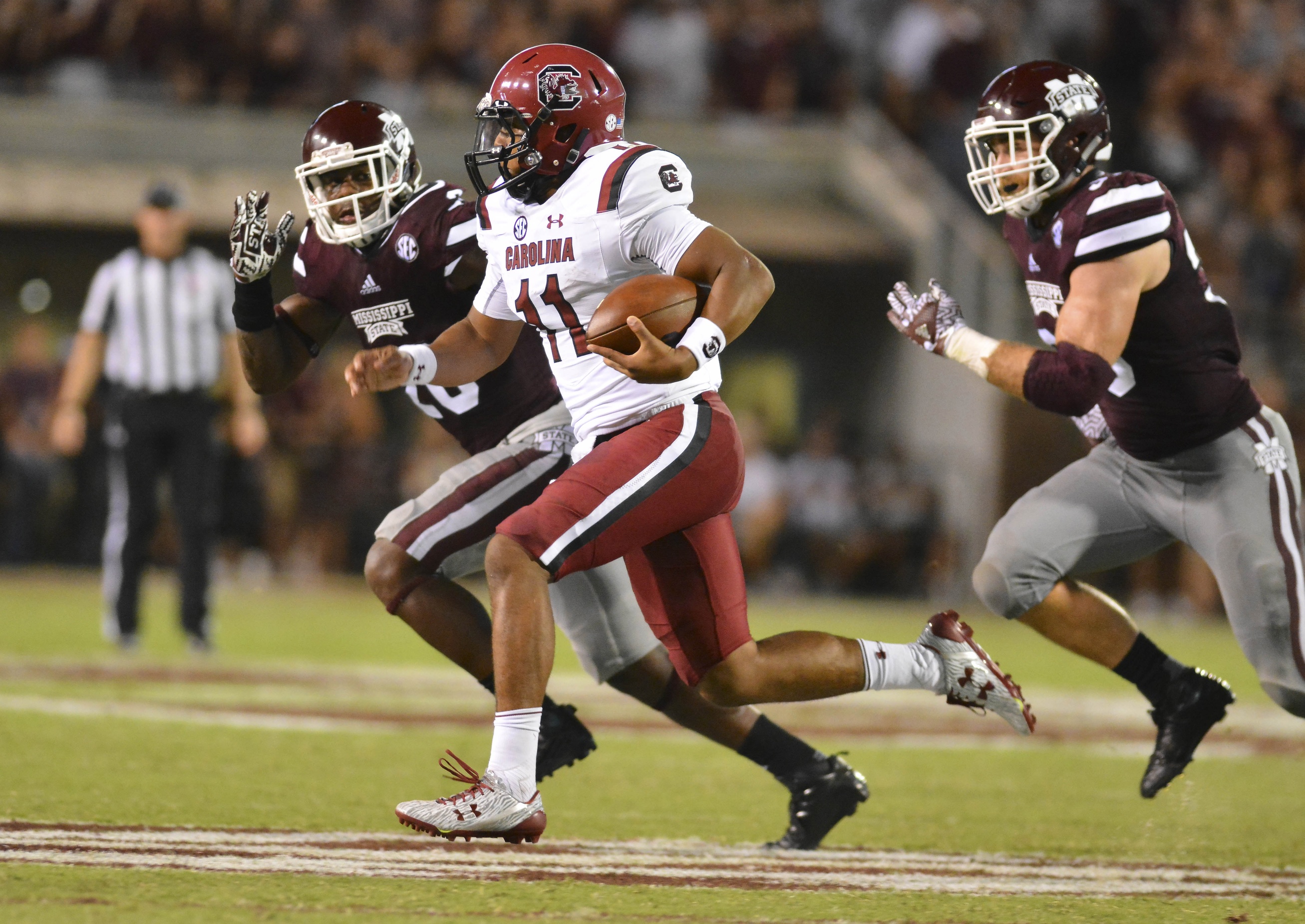 Sep 10, 2016; Starkville, MS, USA;South Carolina Gamecocks quarterback Brandon McIlwain (11) runs the ball during the third quarter of the game against the Mississippi State Bulldogs at Davis Wade Stadium. Mississippi State won 27-14. Mandatory Credit: Matt Bush-USA TODAY Sports