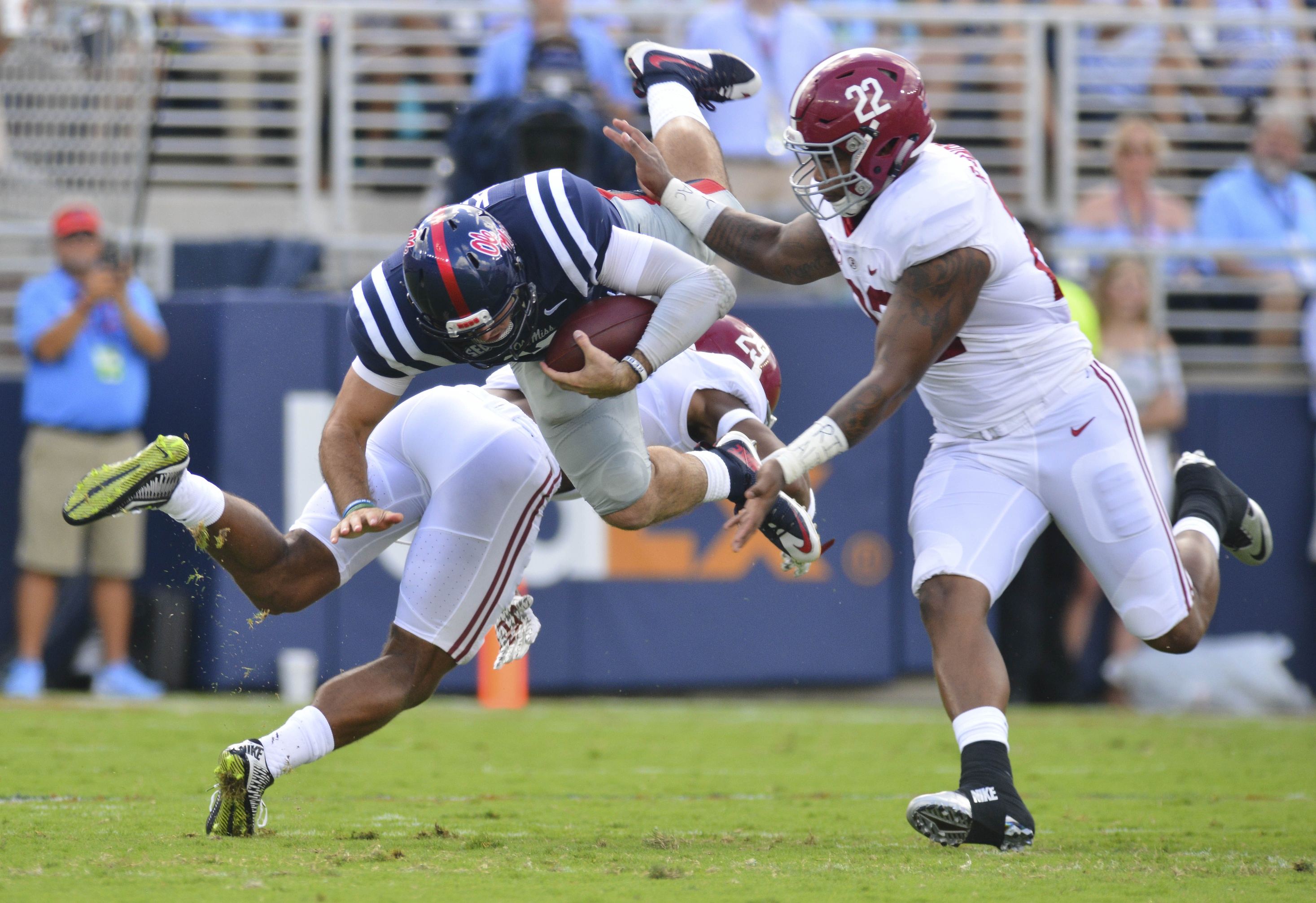 Sep 17, 2016; Oxford, MS, USA; Mississippi Rebels quarterback Chad Kelly (10) is tackled by Alabama Crimson Tide defensive back Minkah Fitzpatrick (29) during the first quarter of the game at Vaught-Hemingway Stadium. Mandatory Credit: Matt Bush-USA TODAY Sports