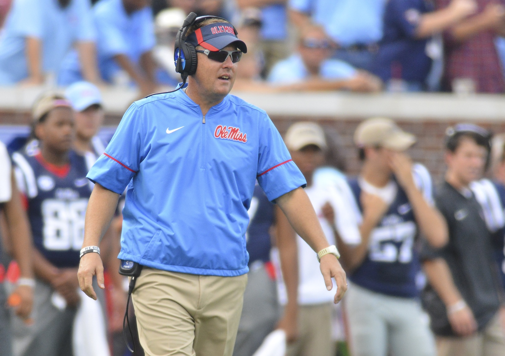 Sep 17, 2016; Oxford, MS, USA; Mississippi Rebels head coach Hugh Freeze walks onto the field to check on an injured player during the first quarter of the game against the Alabama Crimson Tide at Vaught-Hemingway Stadium. Mandatory Credit: Matt Bush-USA TODAY Sports