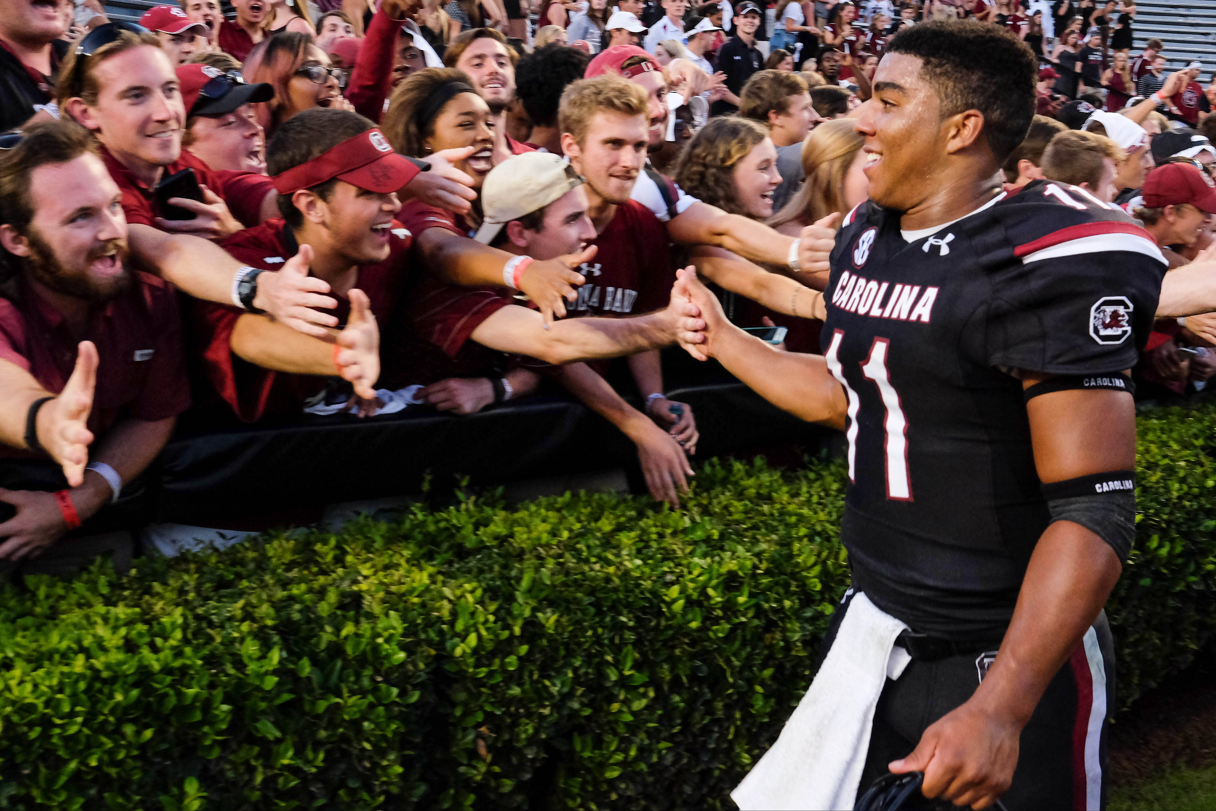 Sep 17, 2016; Columbia, SC, USA; South Carolina Gamecocks quarterback Brandon McIlwain (11) greets students after the win against the East Carolina Pirates at Williams-Brice Stadium. South Carolina wins 20-15 over ECU. Mandatory Credit: Jim Dedmon-USA TODAY Sports