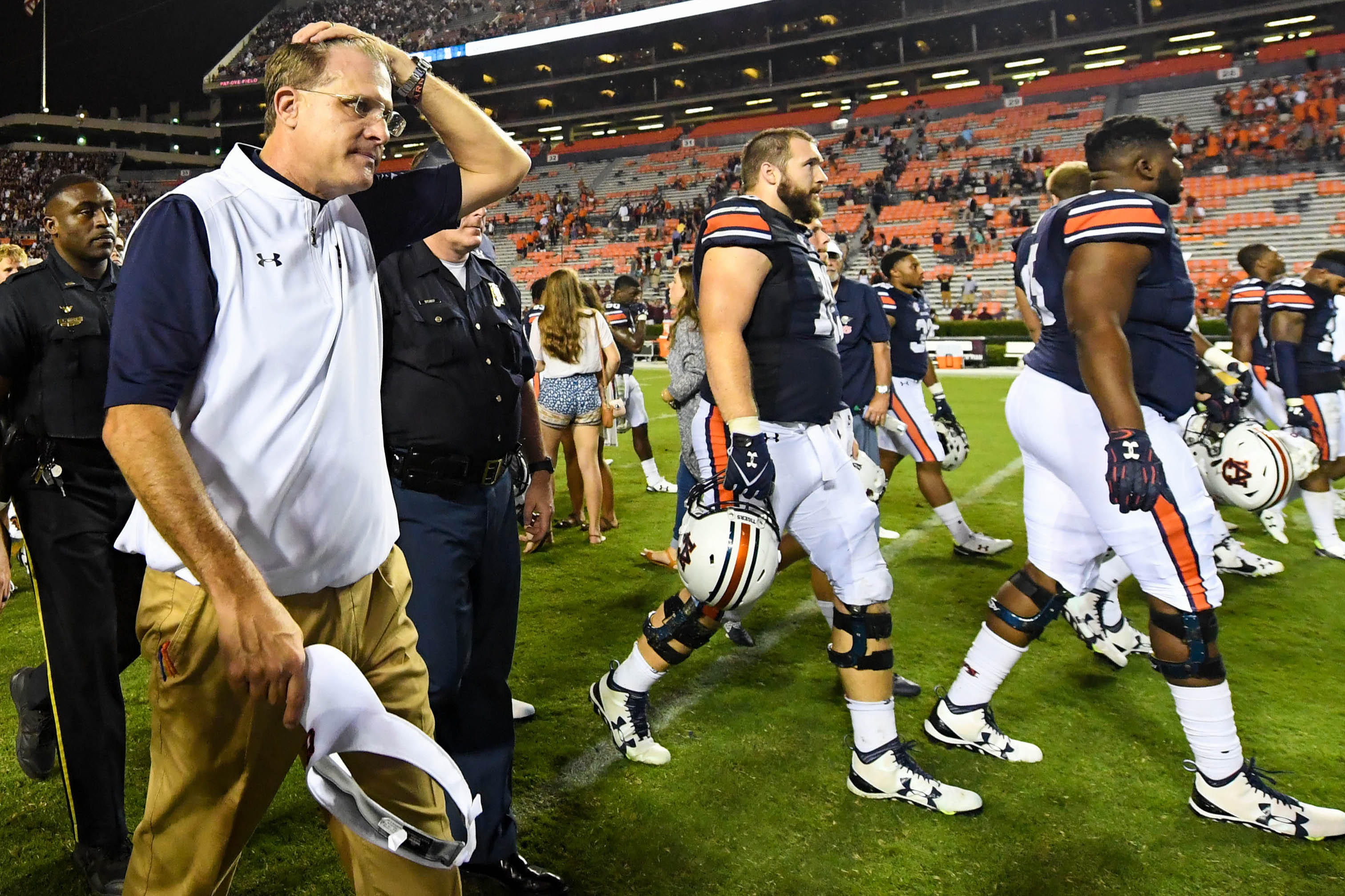 Sep 17, 2016; Auburn, AL, USA; Auburn Tigers head coach Gus Malzahn walks off the field with his team after the game against the Texas A&M Aggies at Jordan Hare Stadium. Texas A&M defeated Aubrn 29-16. Mandatory Credit: Shanna Lockwood-USA TODAY Sports