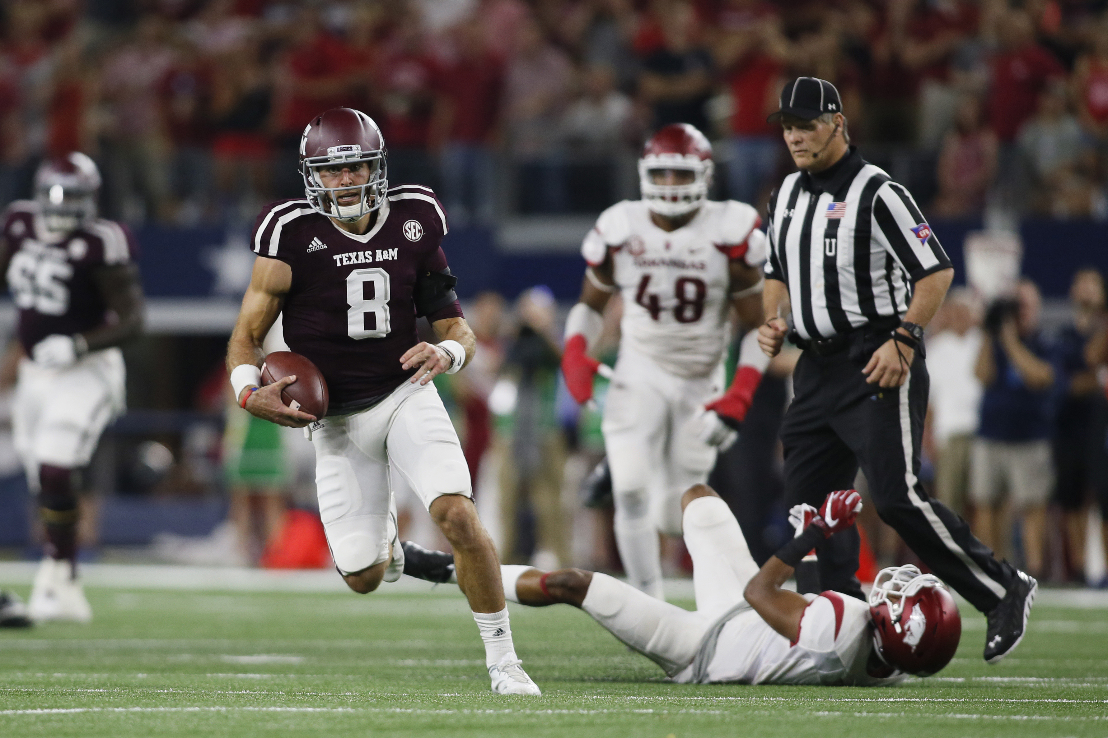 Sep 24, 2016; Dallas, TX, USA; Texas A&M Aggies quarterback Trevor Knight (8) runs for a touchdown in the second quarter against the Arkansas Razorbacks at AT&T Stadium. Mandatory Credit: Tim Heitman-USA TODAY Sports