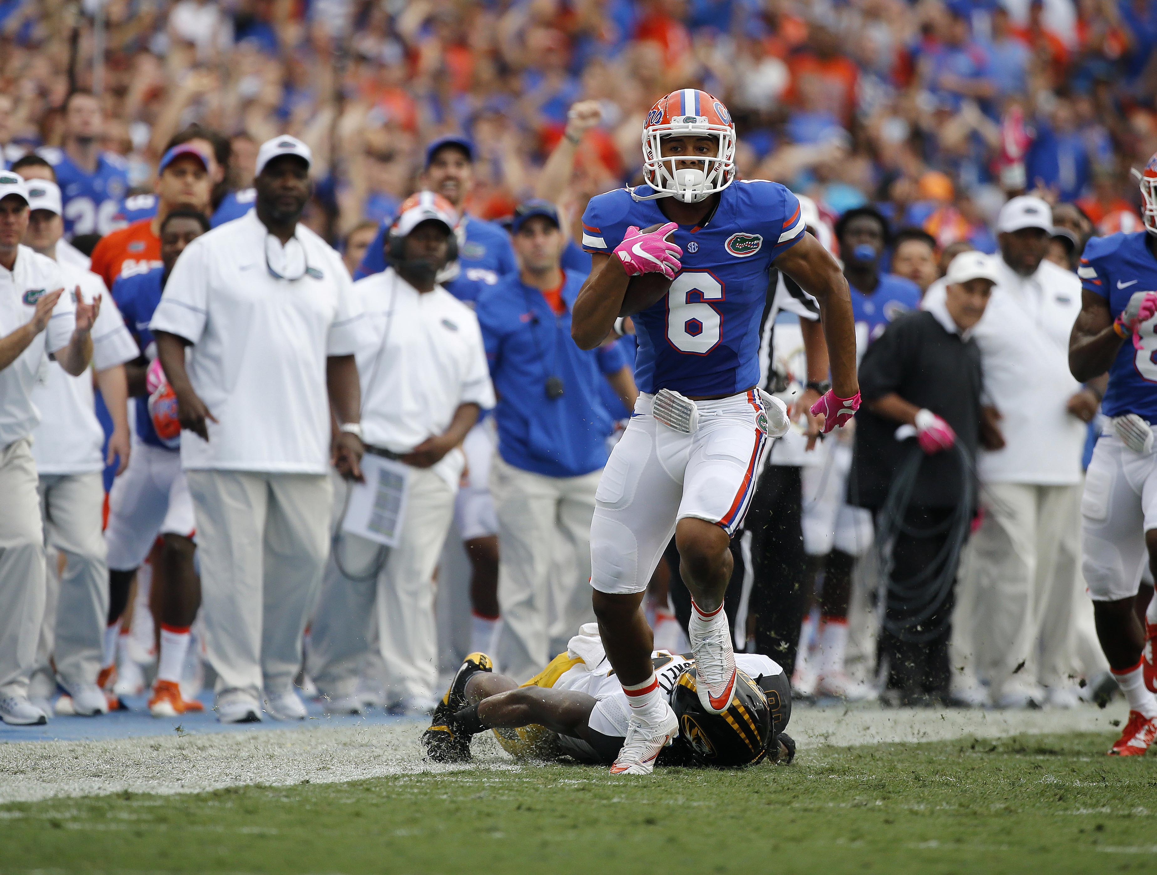 Oct 15, 2016; Gainesville, FL, USA; Florida Gators defensive back Quincy Wilson (6) intercepted the ball and ran it back for a touchdown against the Missouri Tigers eduring the second quarter at Ben Hill Griffin Stadium. Mandatory Credit: Kim Klement-USA TODAY Sports