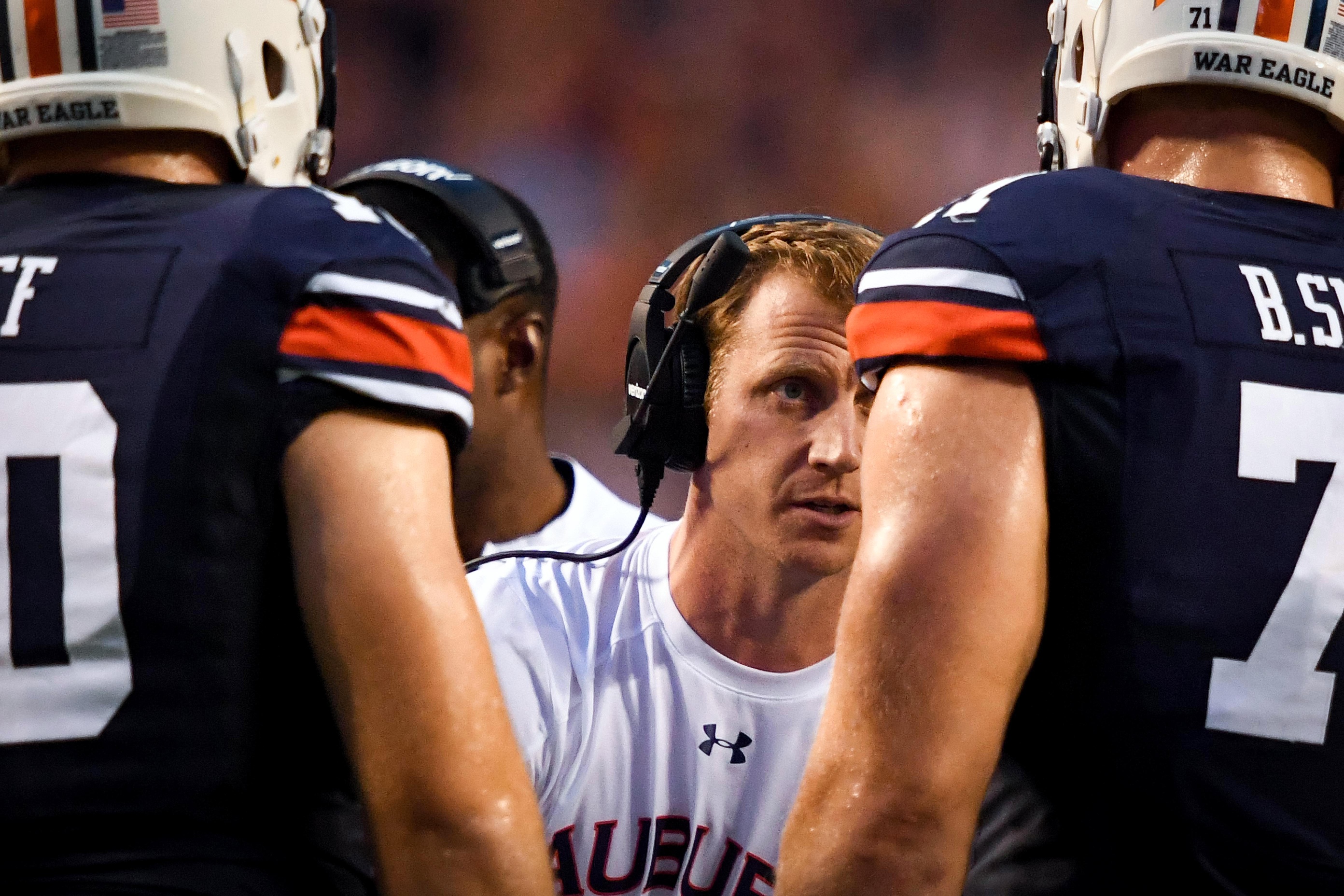 Sep 17, 2016; Auburn, AL, USA; Auburn Tigers offensive coordinator Rhett Lashlee speaks to players during a timeout in the first quarter against the Texas A&M Aggies at Jordan Hare Stadium. Mandatory Credit: Shanna Lockwood-USA TODAY Sports