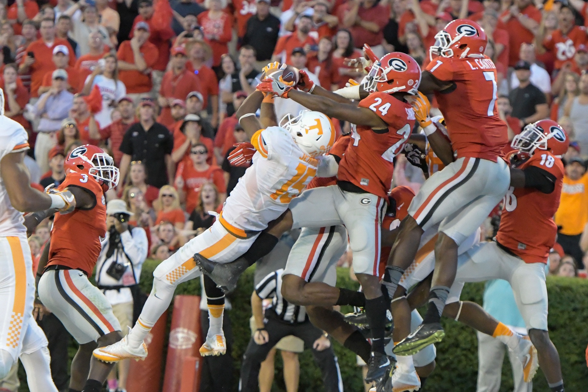 Oct 1, 2016; Athens, GA, USA; Tennessee Volunteers wide receiver Jauan Jennings (15) catches a game winning touchdown pass in front of Georgia Bulldogs safety Dominick Sanders (24) on the last play on the game during the fourth quarter at Sanford Stadium. Tennessee defeated Georgia 34-31. Mandatory Credit: Dale Zanine-USA TODAY Sports