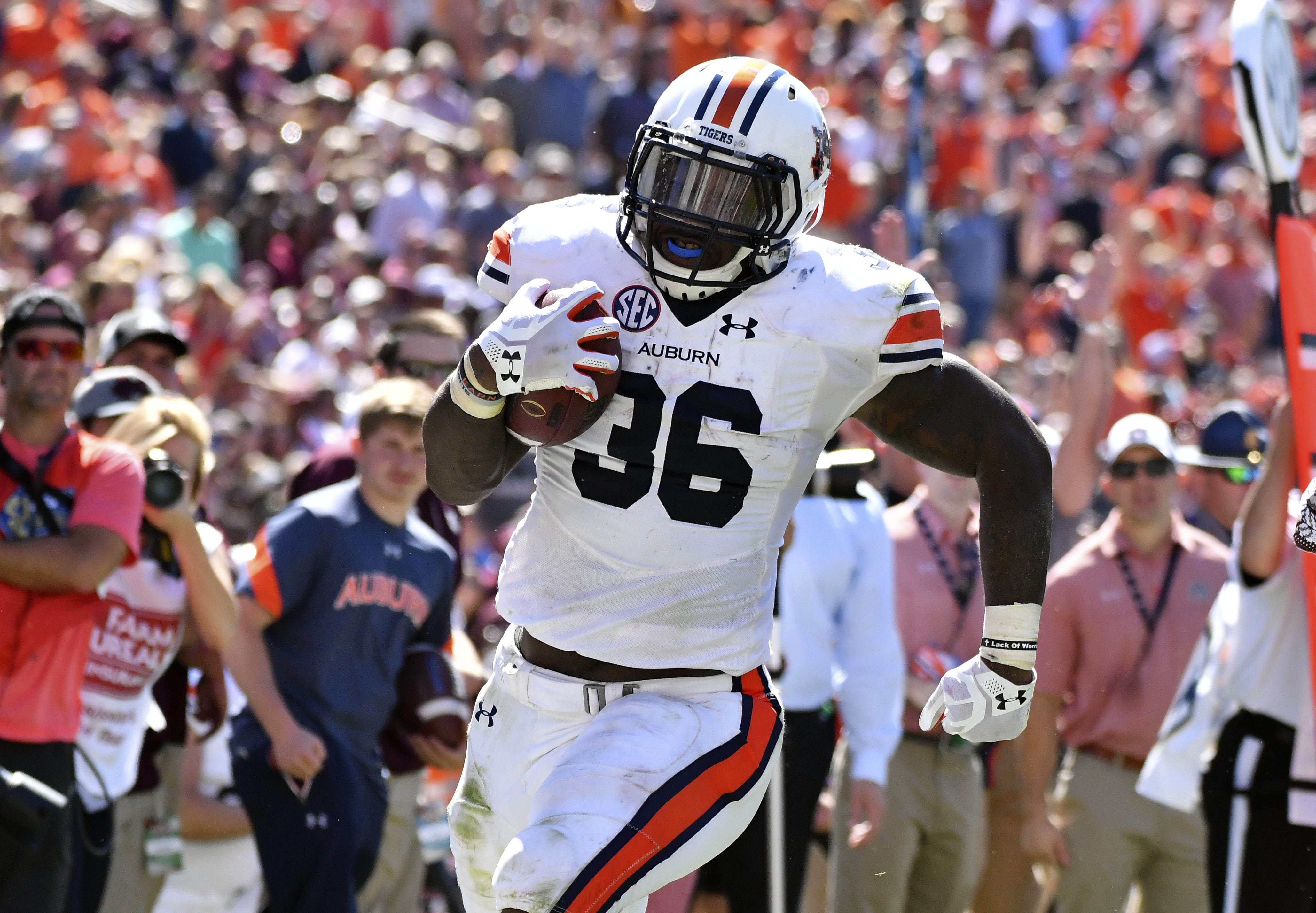 Oct 8, 2016; Starkville, MS, USA; Auburn Tigers running back Kamryn Pettway (36) runs the ball during the second quarter of the game against the Mississippi State Bulldogs at Davis Wade Stadium. Mandatory Credit: Matt Bush-USA TODAY Sports