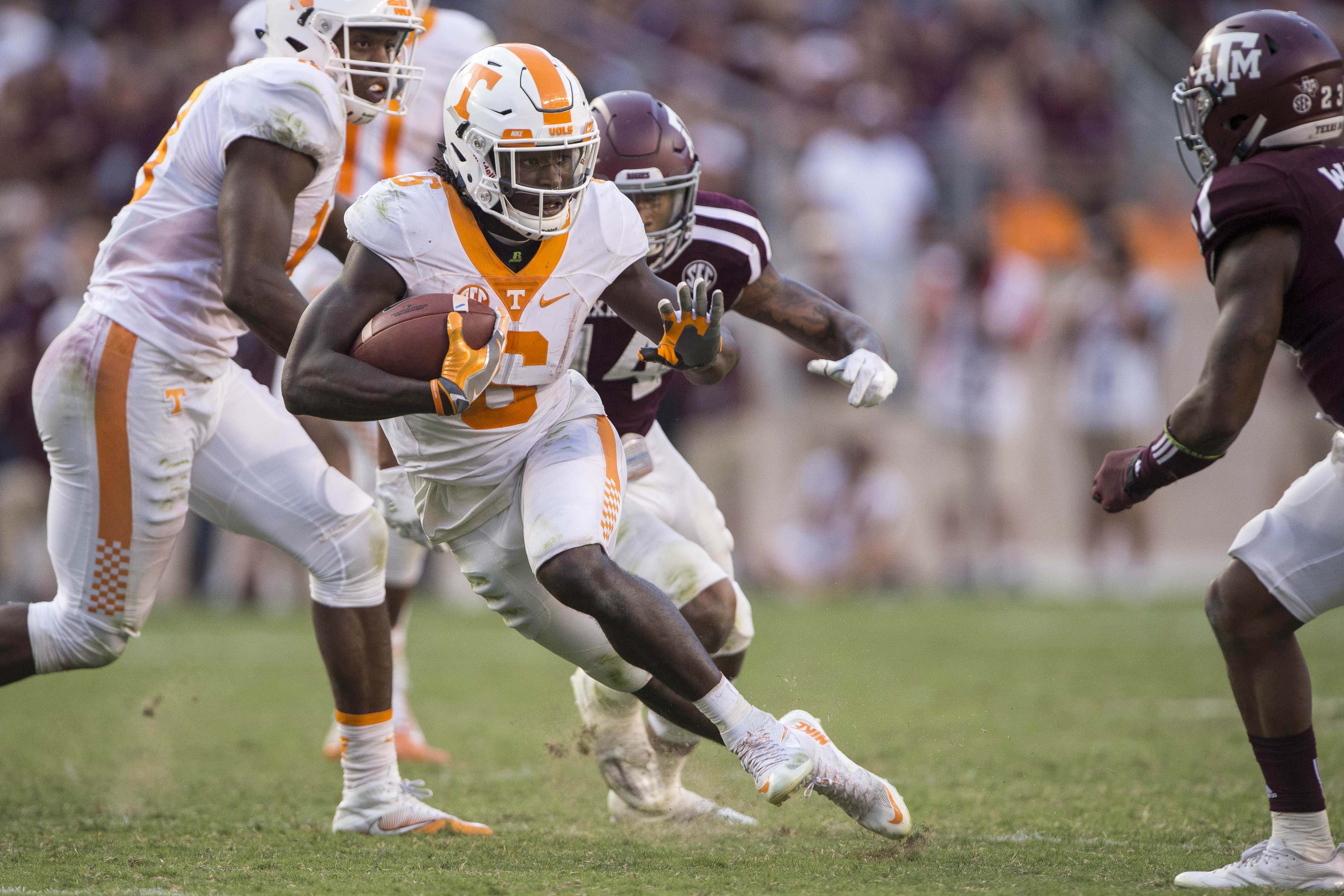 Oct 8, 2016; College Station, TX, USA; Tennessee Volunteers running back Alvin Kamara (6) runs for a first down against the Texas A&M Aggies during the second half at Kyle Field. The Aggies defeat the Volunteers 45-38 in overtime. Mandatory Credit: Jerome Miron-USA TODAY Sports