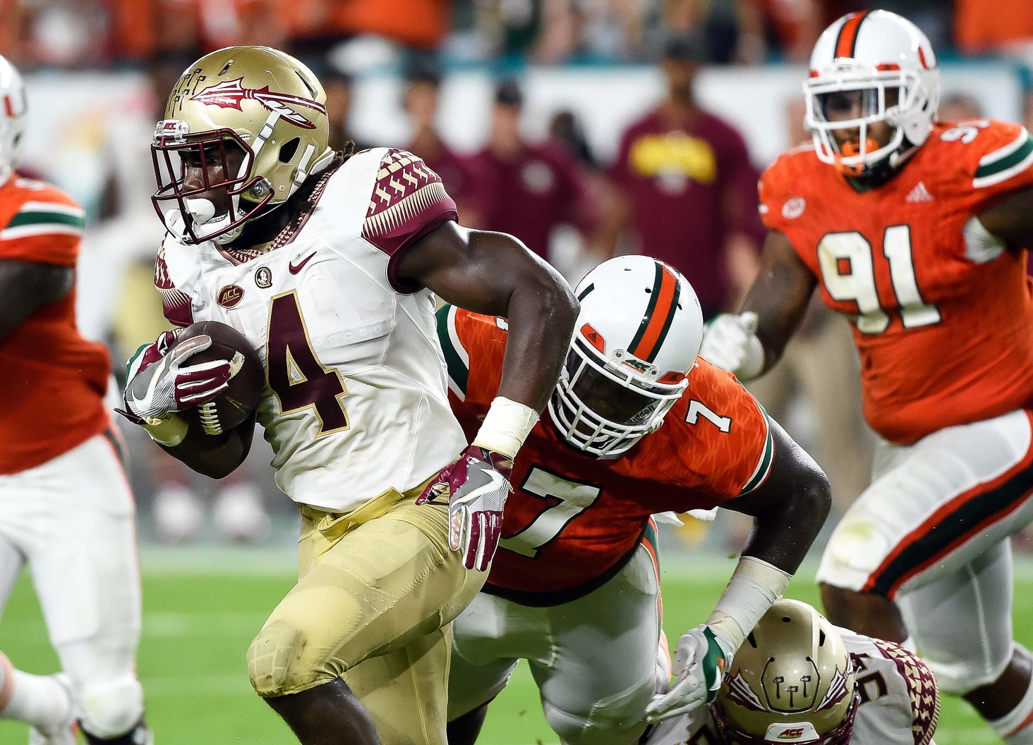Oct 8, 2016; Miami Gardens, FL, USA; Florida State Seminoles running back Dalvin Cook (4) carries the ball during the first half against Miami Hurricanes at Hard Rock Stadium. Mandatory Credit: Steve Mitchell-USA TODAY Sports