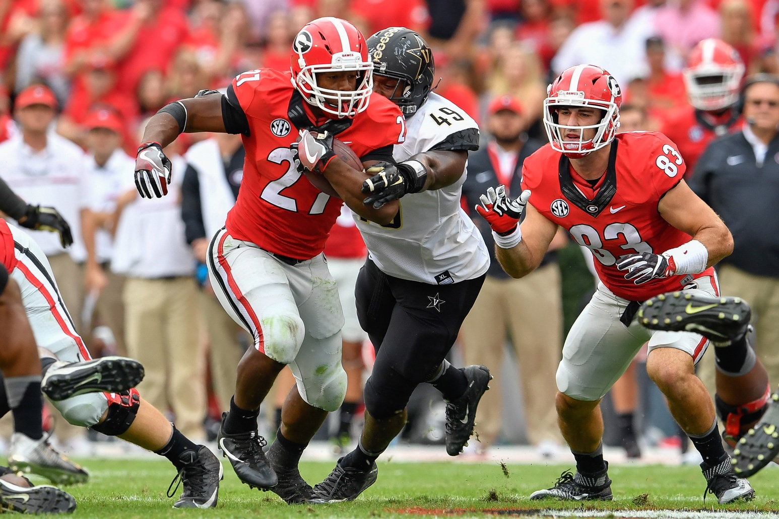 Oct 15, 2016; Athens, GA, USA; Georgia Bulldogs running back Nick  Chubb (27) runs against Vanderbilt Commodores defensive end Jonathan Wynn (49) during the second half at Sanford Stadium. Vanderbilt defeated Georgia 17-16. Mandatory Credit: Dale Zanine-USA TODAY Sports