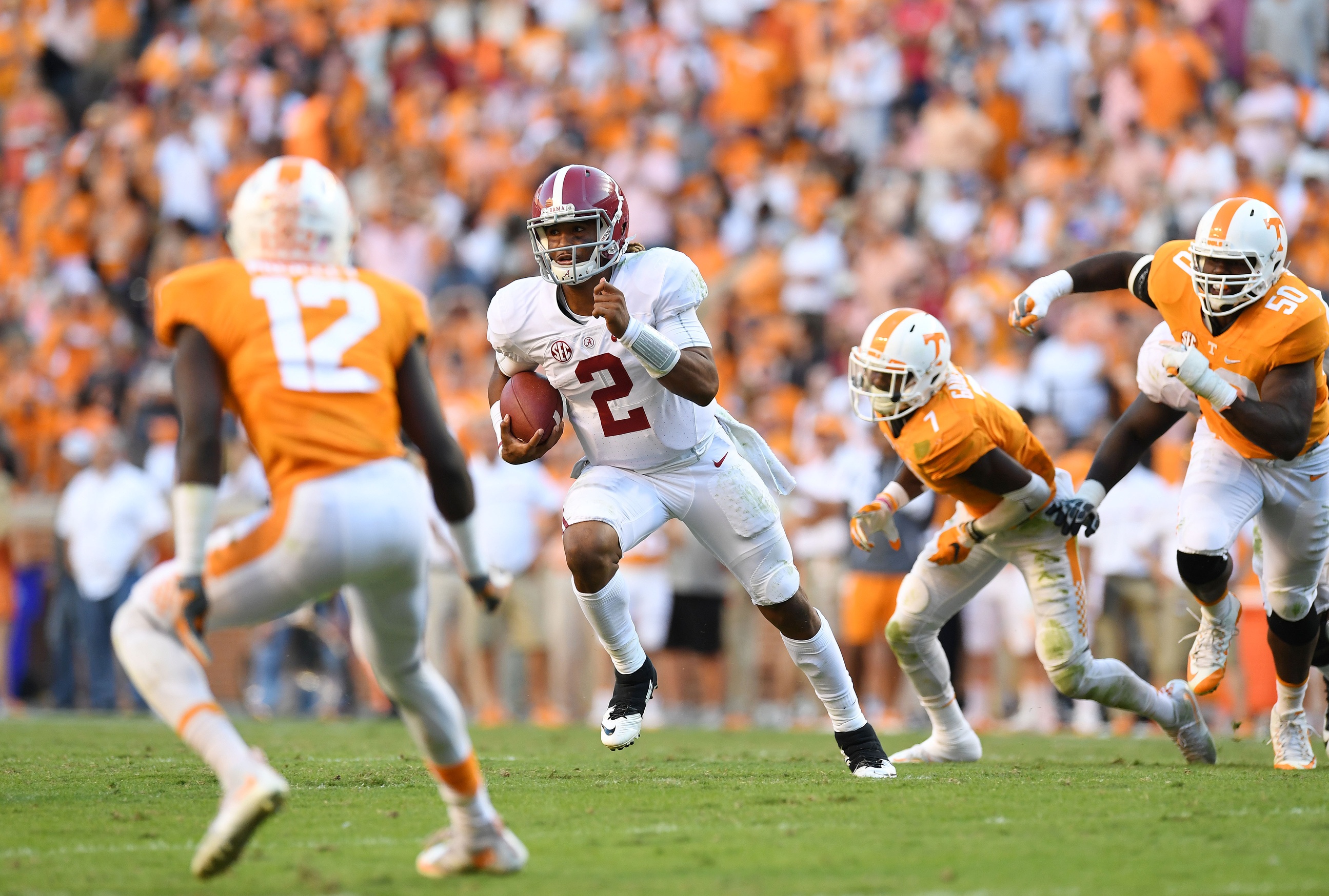Oct 15, 2016; Knoxville, TN, USA; Alabama Crimson Tide quarterback Jalen Hurts (2) carries the ball against the Tennessee Volunteers during the third quarter at Neyland Stadium. Mandatory Credit: John David Mercer-USA TODAY Sports