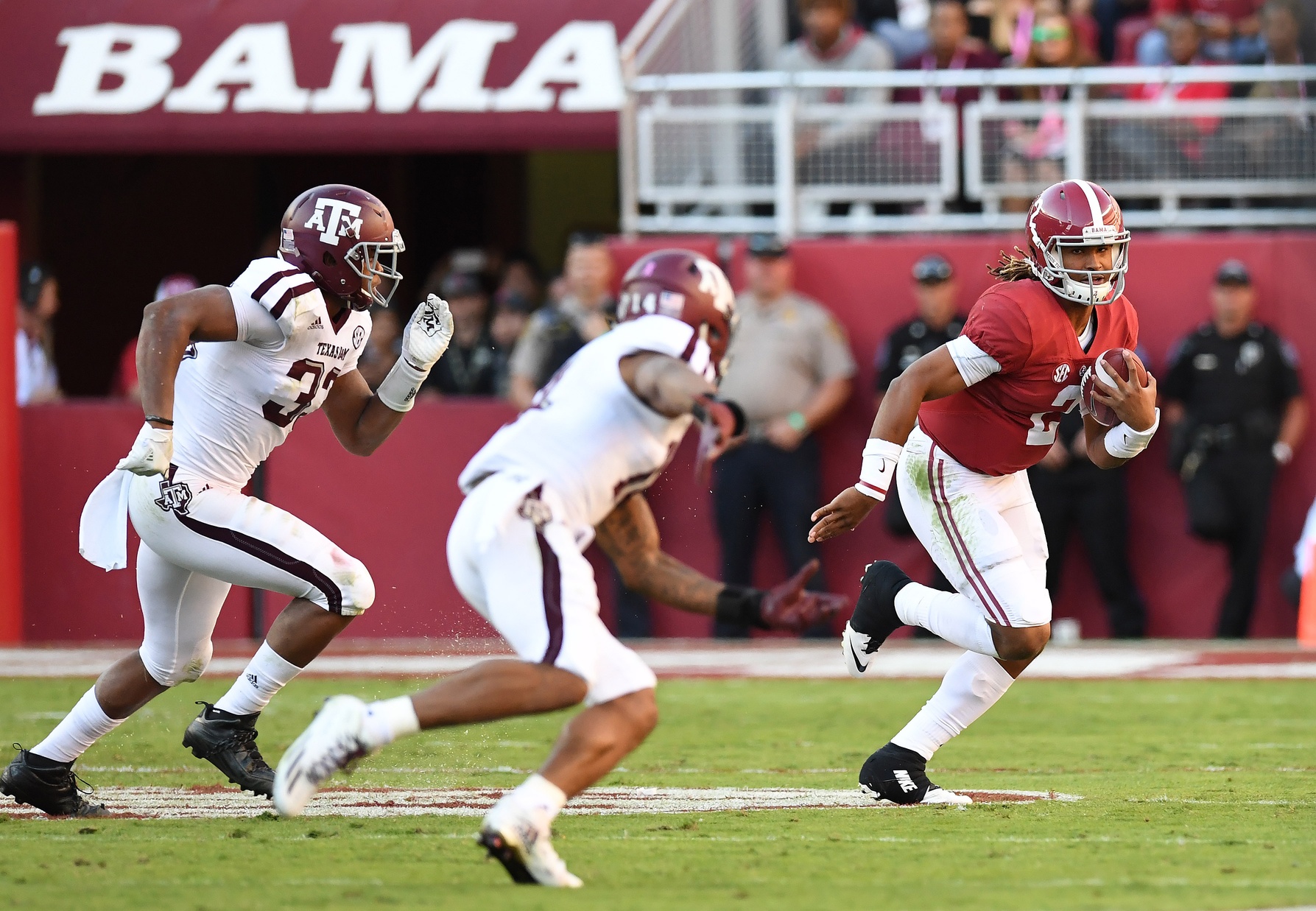Oct 22, 2016; Tuscaloosa, AL, USA; Alabama Crimson Tide quarterback Jalen Hurts (2) carries the ball up the field against the Texas A&M Aggies during the third quarter at Bryant-Denny Stadium. Mandatory Credit: John David Mercer-USA TODAY Sports