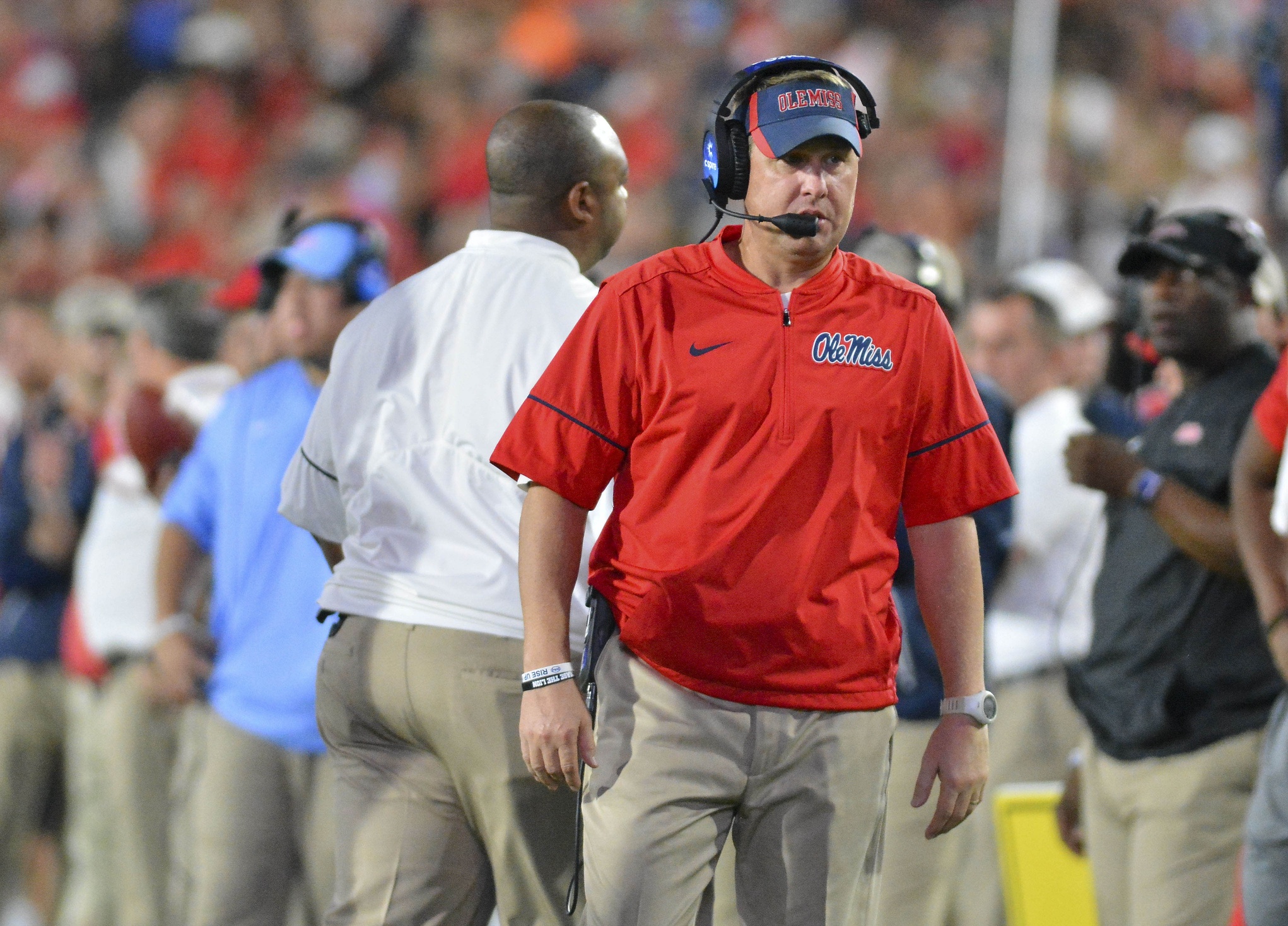 Oct 29, 2016; Oxford, MS, USA; Mississippi Rebels head coach Hugh Freeze talks into his headset during the second quarter of the game against the Auburn Tigers at Vaught-Hemingway Stadium. Mandatory Credit: Matt Bush-USA TODAY Sports