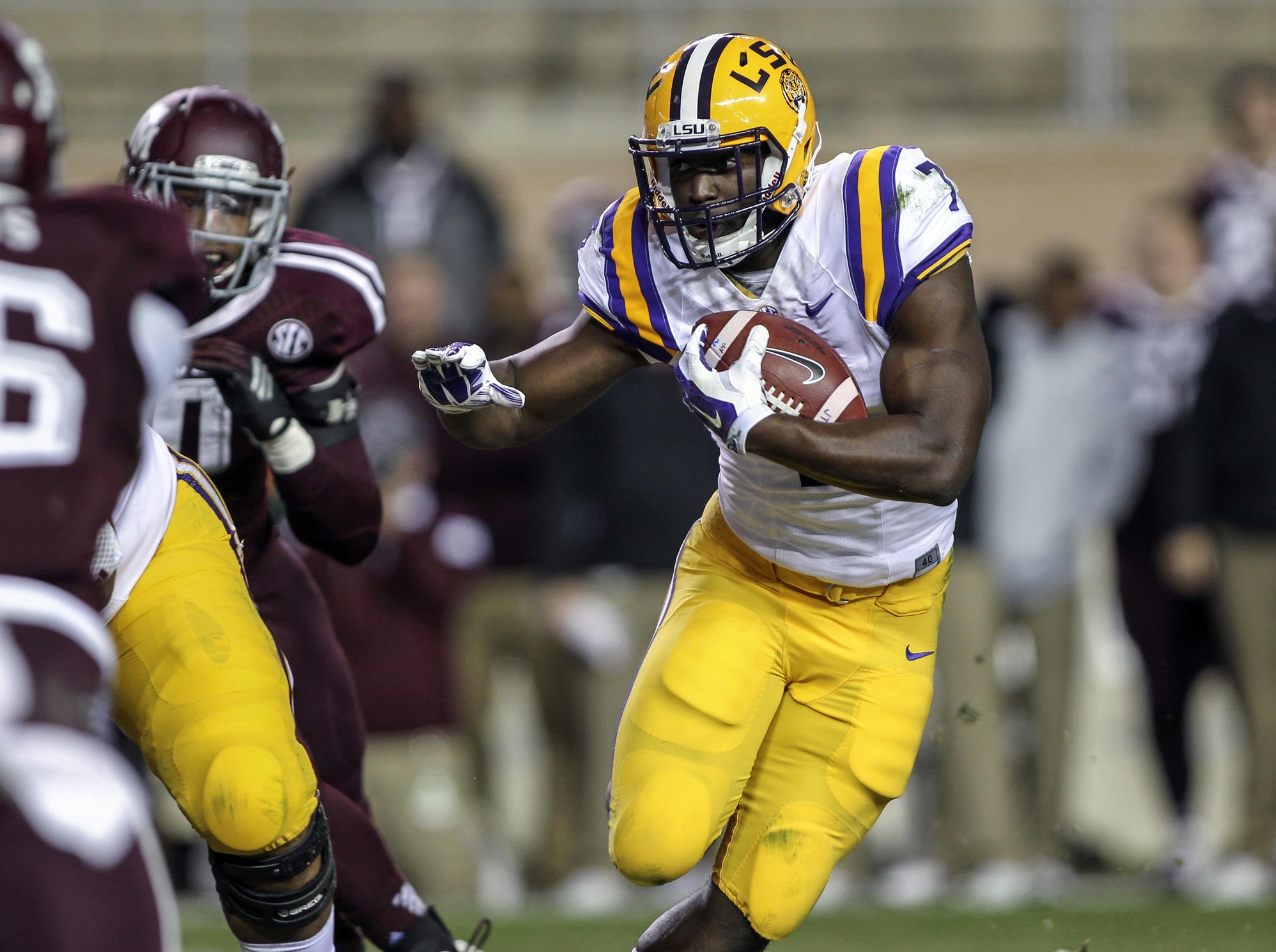 Nov 27, 2014; College Station, TX, USA; LSU Tigers running back Leonard Fournette (7) rushes during the second quarter against the Texas A&M Aggies at Kyle Field. Mandatory Credit: Troy Taormina-USA TODAY Sports