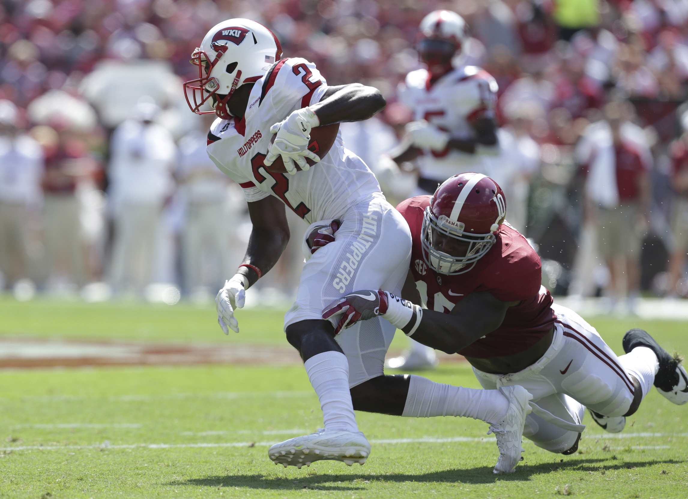 Sep 10, 2016; Tuscaloosa, AL, USA; Western Kentucky Hilltoppers wide receiver Taywan Taylor (2) is tackled by Alabama Crimson Tide linebacker Reuben Foster (10) at Bryant-Denny Stadium. Mandatory Credit: Marvin Gentry-USA TODAY Sports