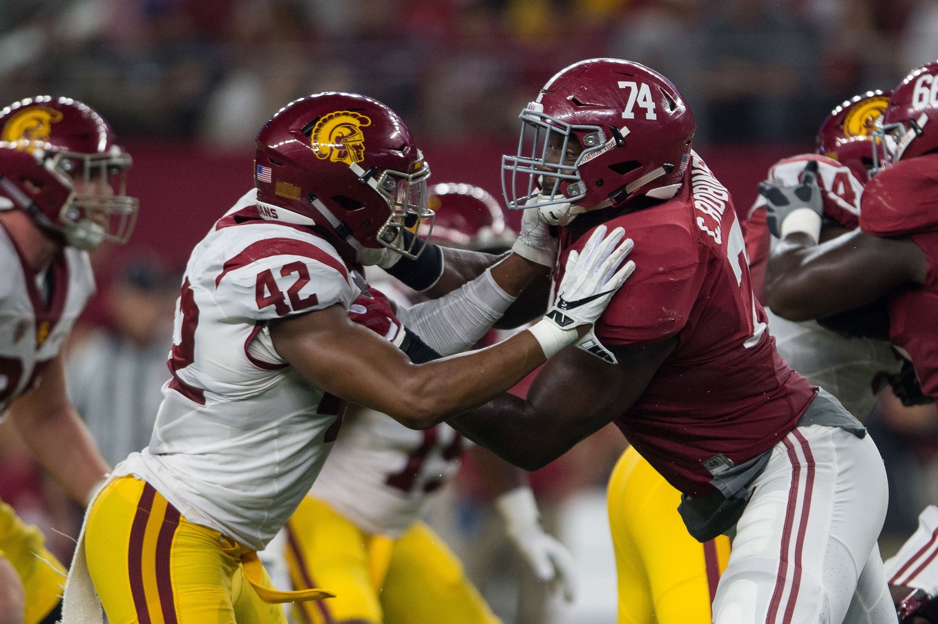 Sep 3, 2016; Arlington, TX, USA; Alabama Crimson Tide offensive lineman Cam Robinson (74) blocks USC Trojans linebacker Uchenna Nwosu (42) during the game at AT&T Stadium. Alabama defeats USC 52-6. Mandatory Credit: Jerome Miron-USA TODAY Sports