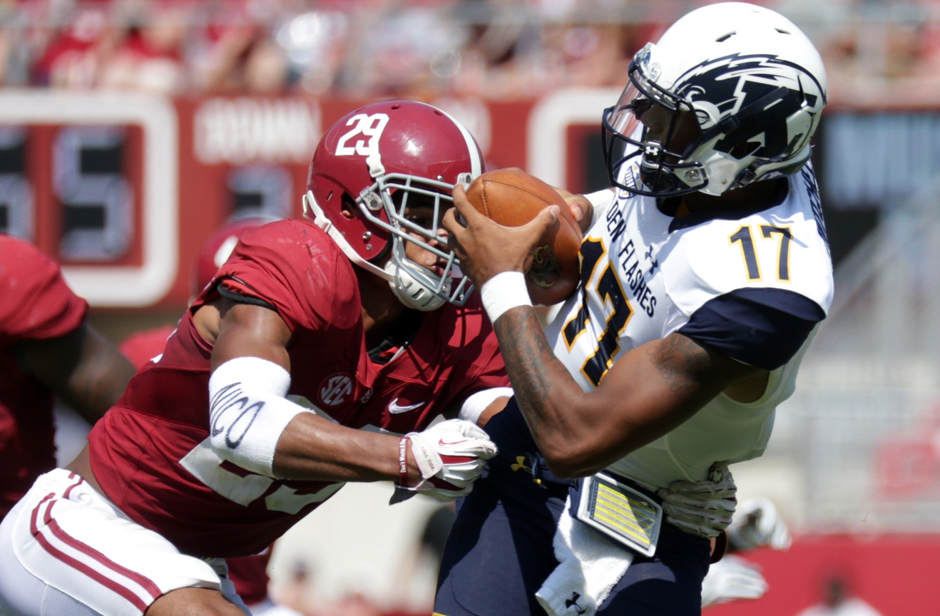 Sep 24, 2016; Tuscaloosa, AL, USA; Kent State Golden Flashes quarterback Mylik Mitchell (17) attempts to get away from Alabama Crimson Tide defensive back Minkah Fitzpatrick (29) at Bryant-Denny Stadium. Mandatory Credit: Marvin Gentry-USA TODAY Sports