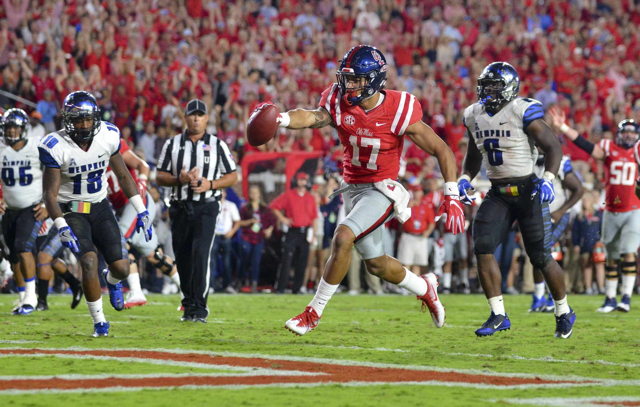 Oct 1, 2016; Oxford, MS, USA; Mississippi Rebels tight end Evan Engram (17) scores a touchdown during the third quarter of the game against the Memphis Tigers at Vaught-Hemingway Stadium. Mississippi won 48-28. Mandatory Credit: Matt Bush-USA TODAY Sports