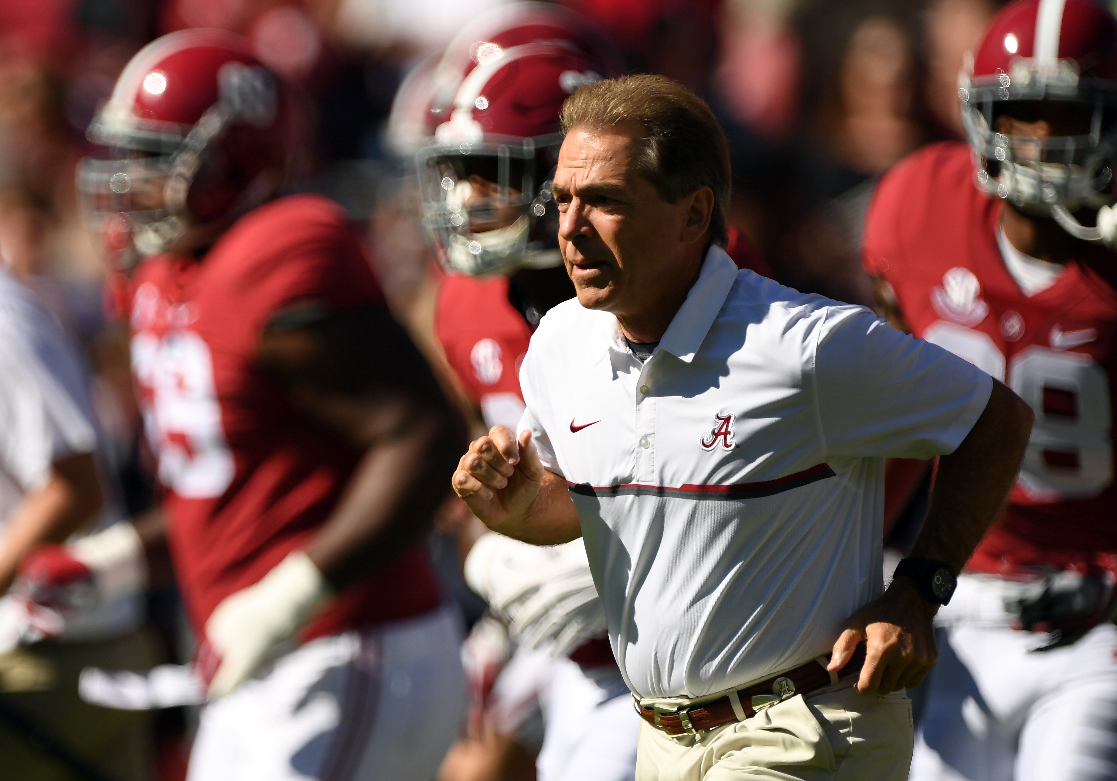 Oct 22, 2016; Tuscaloosa, AL, USA; Alabama Crimson Tide head coach Nick Saban runs out onto the field during pregame before their game against the Texas A&M Aggies at Bryant-Denny Stadium. Mandatory Credit: John David Mercer-USA TODAY Sports