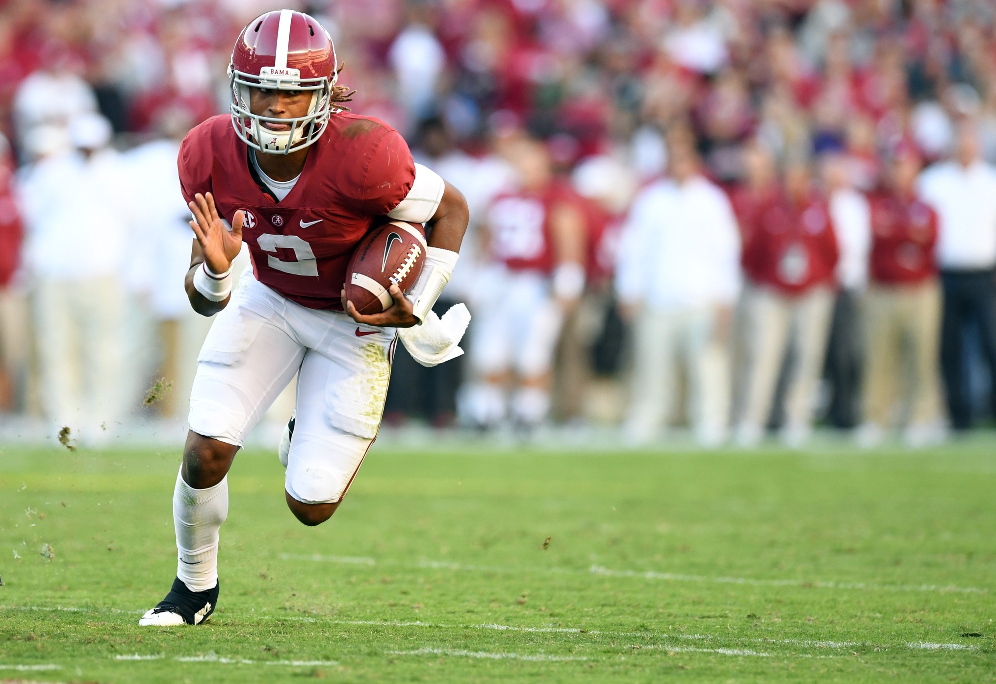 Oct 22, 2016; Tuscaloosa, AL, USA; Alabama Crimson Tide quarterback Jalen Hurts (2) carries the ball up the field against the Texas A&M Aggies during the third quarter at Bryant-Denny Stadium. Mandatory Credit: John David Mercer-USA TODAY Sports