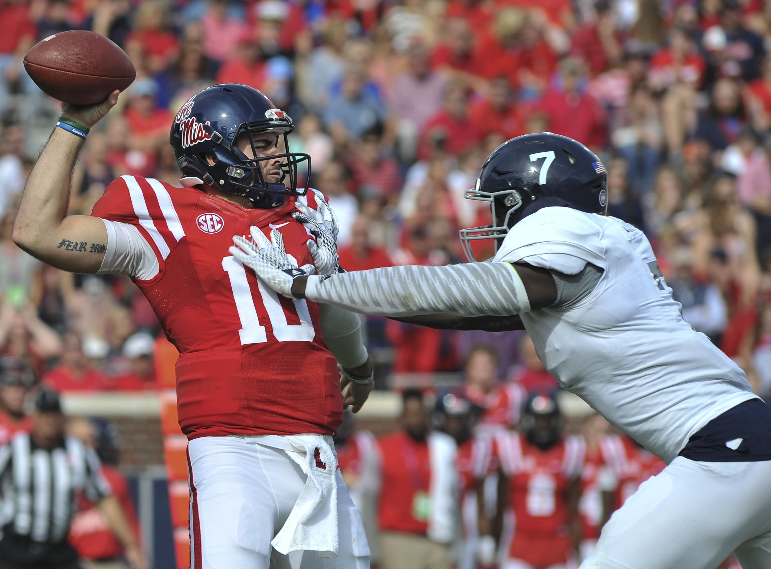 Nov 5, 2016; Oxford, MS, USA; Mississippi Rebels quarterback Chad Kelly (10) is hurried by Georgia Southern Eagles linebacker Ukeme Eligwe (7) during the first half at Vaught-Hemingway Stadium. Mandatory Credit: Justin Ford-USA TODAY Sports