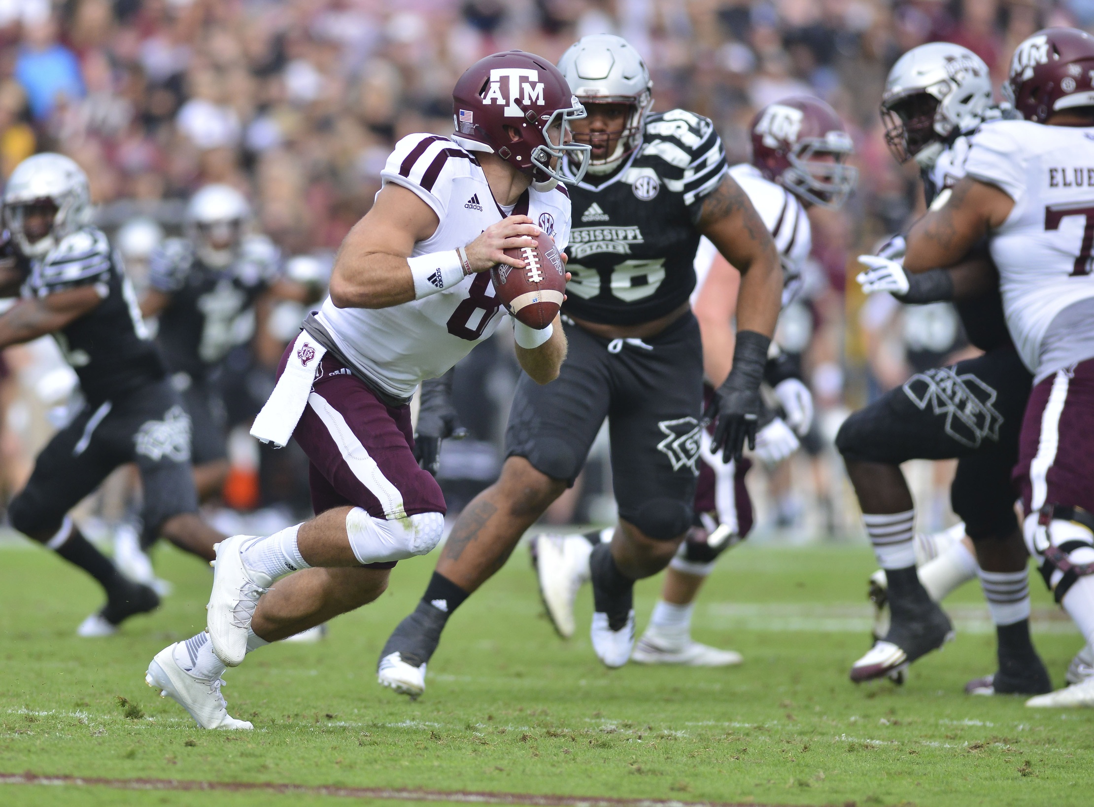 Nov 5, 2016; Starkville, MS, USA; Texas A&M Aggies quarterback Trevor Knight (8) moves in the pocket during the first quarter against the Mississippi State Bulldogs at Davis Wade Stadium. Mandatory Credit: Matt Bush-USA TODAY Sports