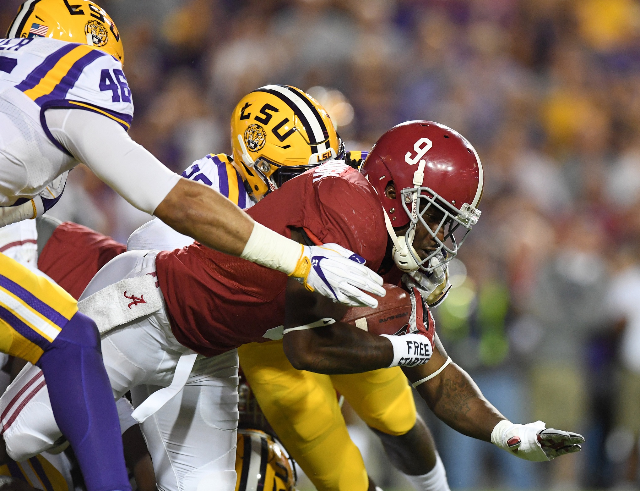 Nov 5, 2016; Baton Rouge, LA, USA; Alabama Crimson Tide running back Bo Scarbrough (9) carries against the LSU Tigers during the second quarter at Tiger Stadium. Mandatory Credit: John David Mercer-USA TODAY Sports