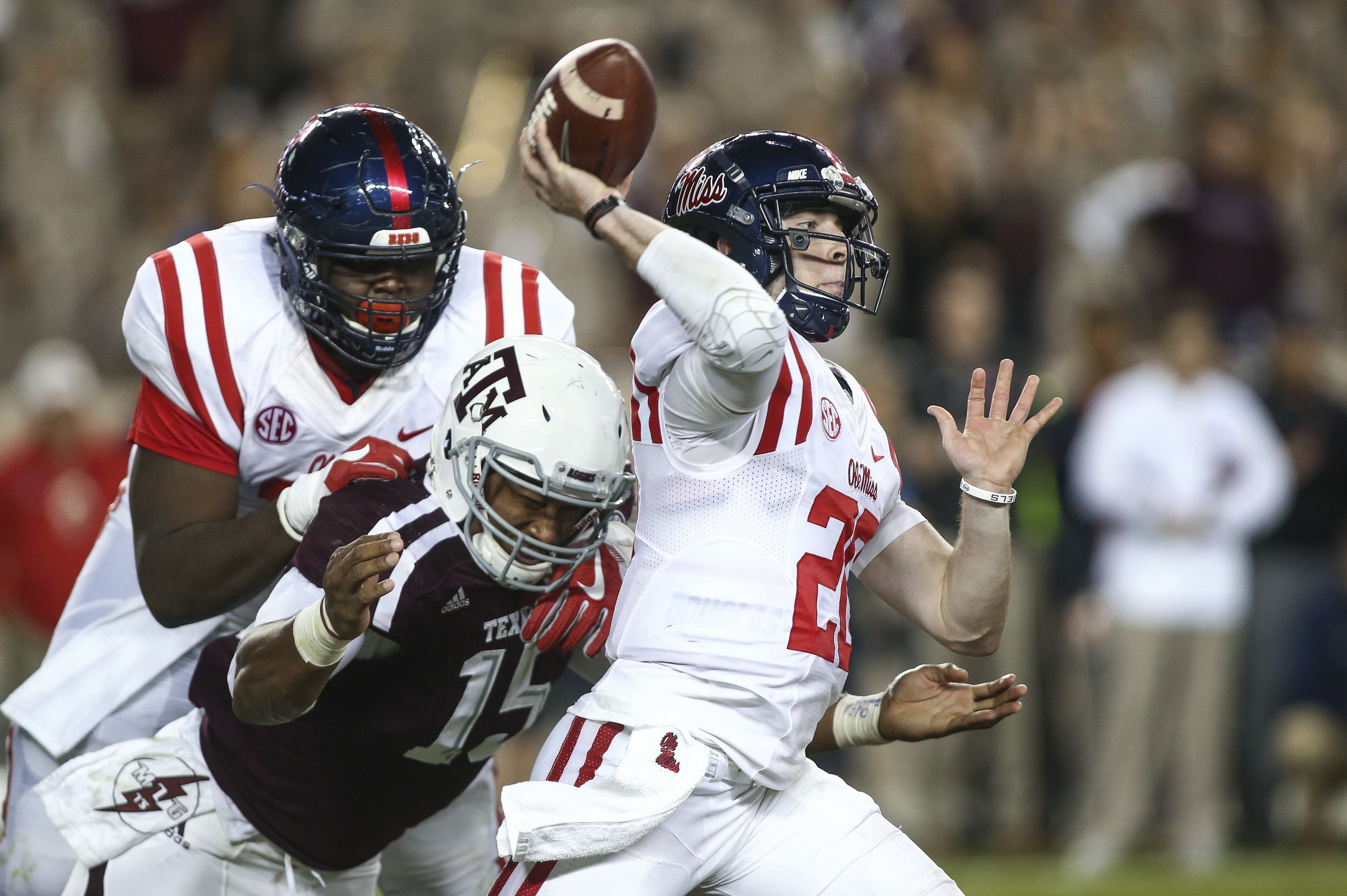 Nov 12, 2016; College Station, TX, USA; Texas A&M Aggies defensive lineman Myles Garrett (15) attempts to sack Mississippi Rebels quarterback Shea Patterson (20) during the second quarter at Kyle Field. Mandatory Credit: Troy Taormina-USA TODAY Sports