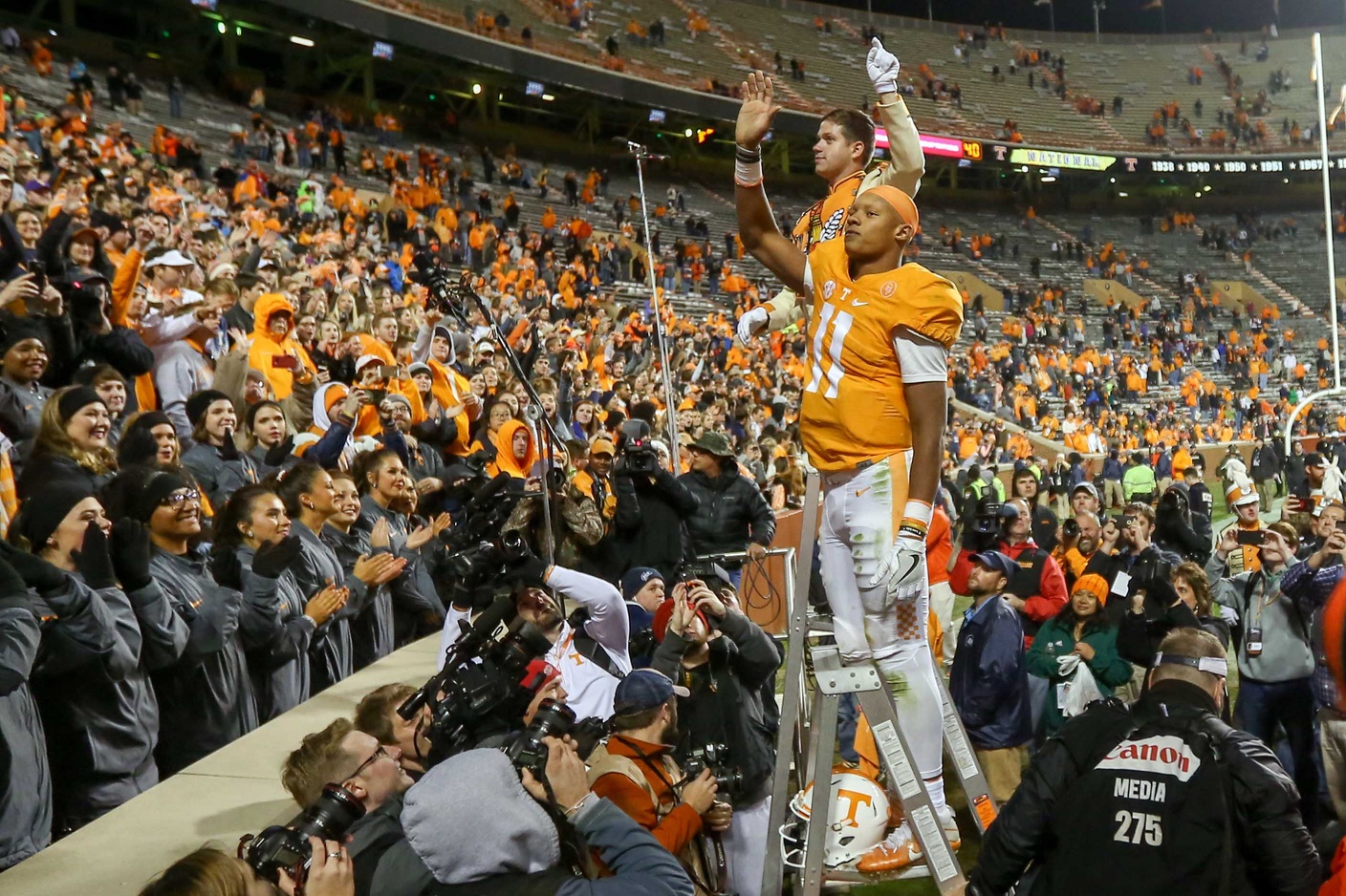 Nov 19, 2016; Knoxville, TN, USA; Tennessee Volunteers quarterback Joshua Dobbs (11) directs the band after the game against the Missouri Tigers at Neyland Stadium. Tennessee won 63 to 37. Mandatory Credit: Randy Sartin-USA TODAY Sports