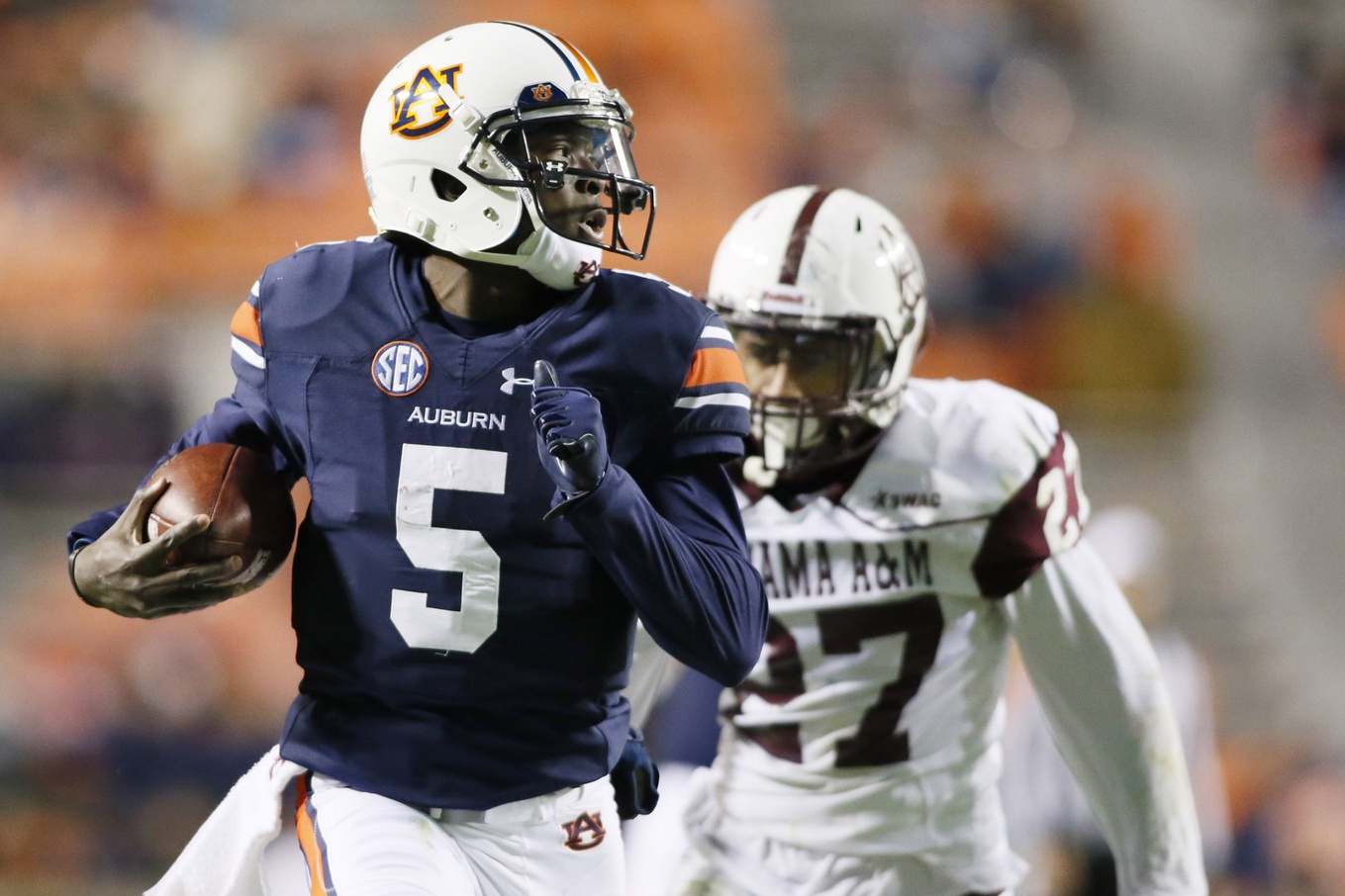 Nov 19, 2016; Auburn, AL, USA; Auburn Tigers quarterback John Franklin (5) scores a touchdown during the third quarter against the Alabama A&M Bulldogs at Jordan Hare Stadium. Mandatory Credit: John Reed-USA TODAY Sports