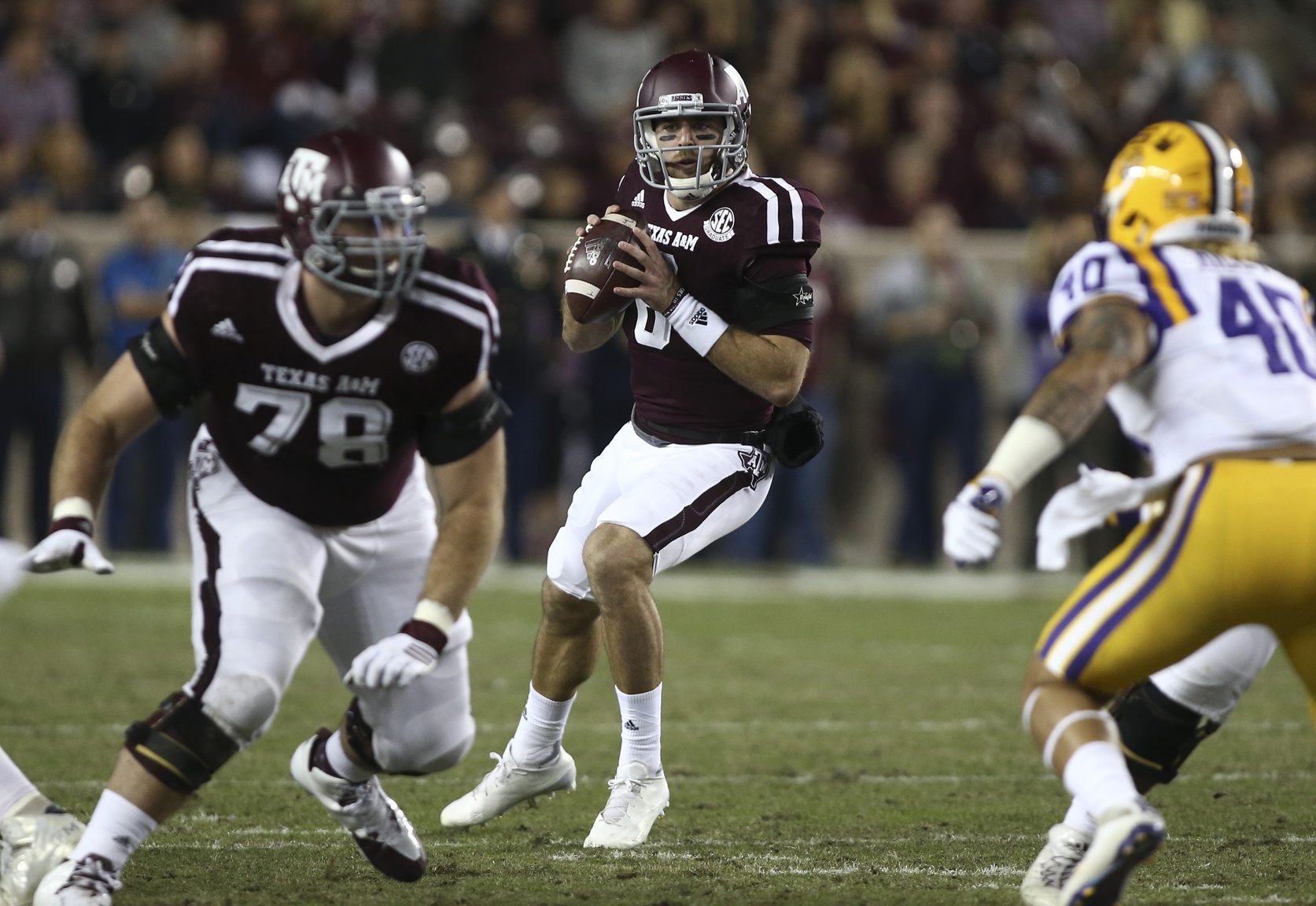 Nov 24, 2016; College Station, TX, USA; Texas A&M Aggies quarterback Trevor Knight (8) looks for an open receiver during the first half against the LSU Tigers at Kyle Field. Mandatory Credit: Troy Taormina-USA TODAY Sports