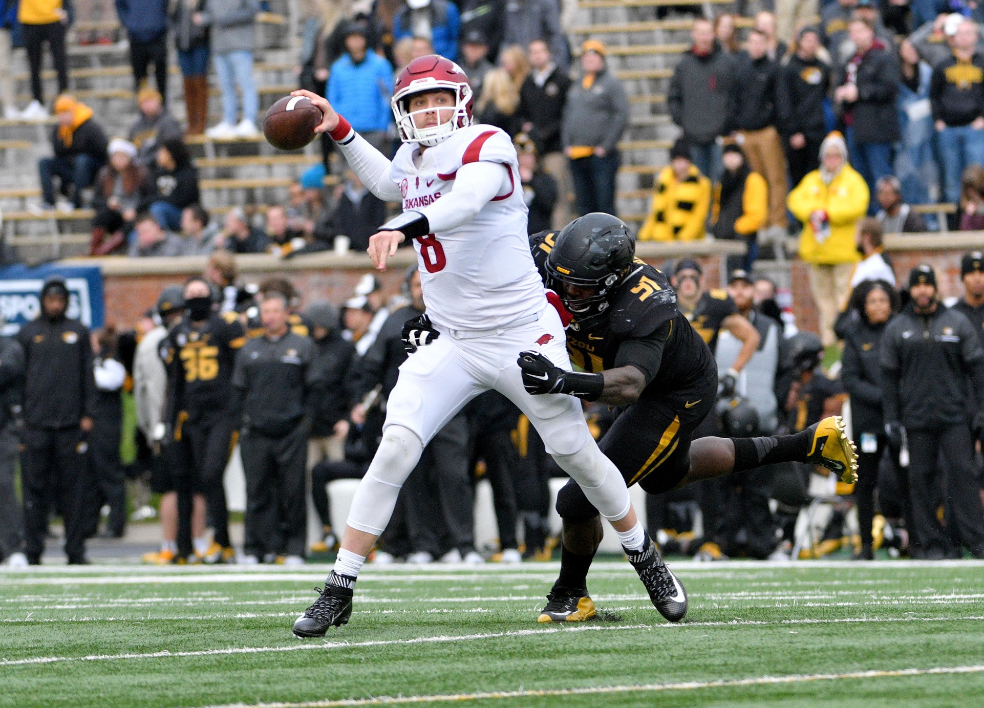 Nov 25, 2016; Columbia, MO, USA; Arkansas Razorbacks quarterback Austin Allen (8) throws a pass while being pressured by Missouri Tigers defensive lineman Marcell Frazier (16) during the first half at Faurot Field. Mandatory Credit: Denny Medley-USA TODAY Sports