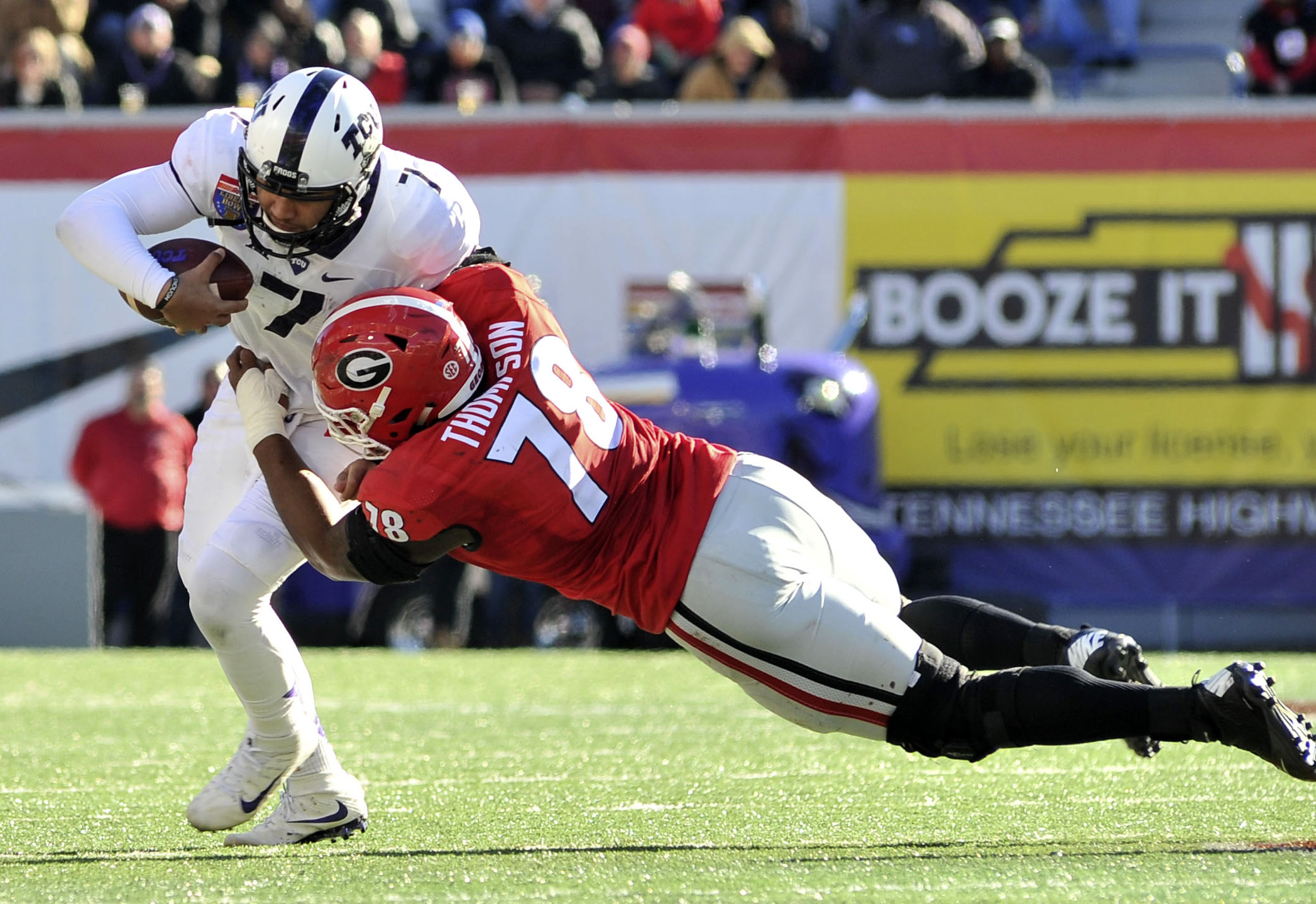 Dec 30, 2016; Memphis, TN, USA; Georgia Bulldogs defensive tackle Trenton Thompson (78) sacks TCU Horned Frogs quarterback Kenny Hill (7) during the second half at Liberty Bowl. Georgia Bulldogs defeated the TCU Horned Frogs 31-23. Mandatory Credit: Justin Ford-USA TODAY Sports