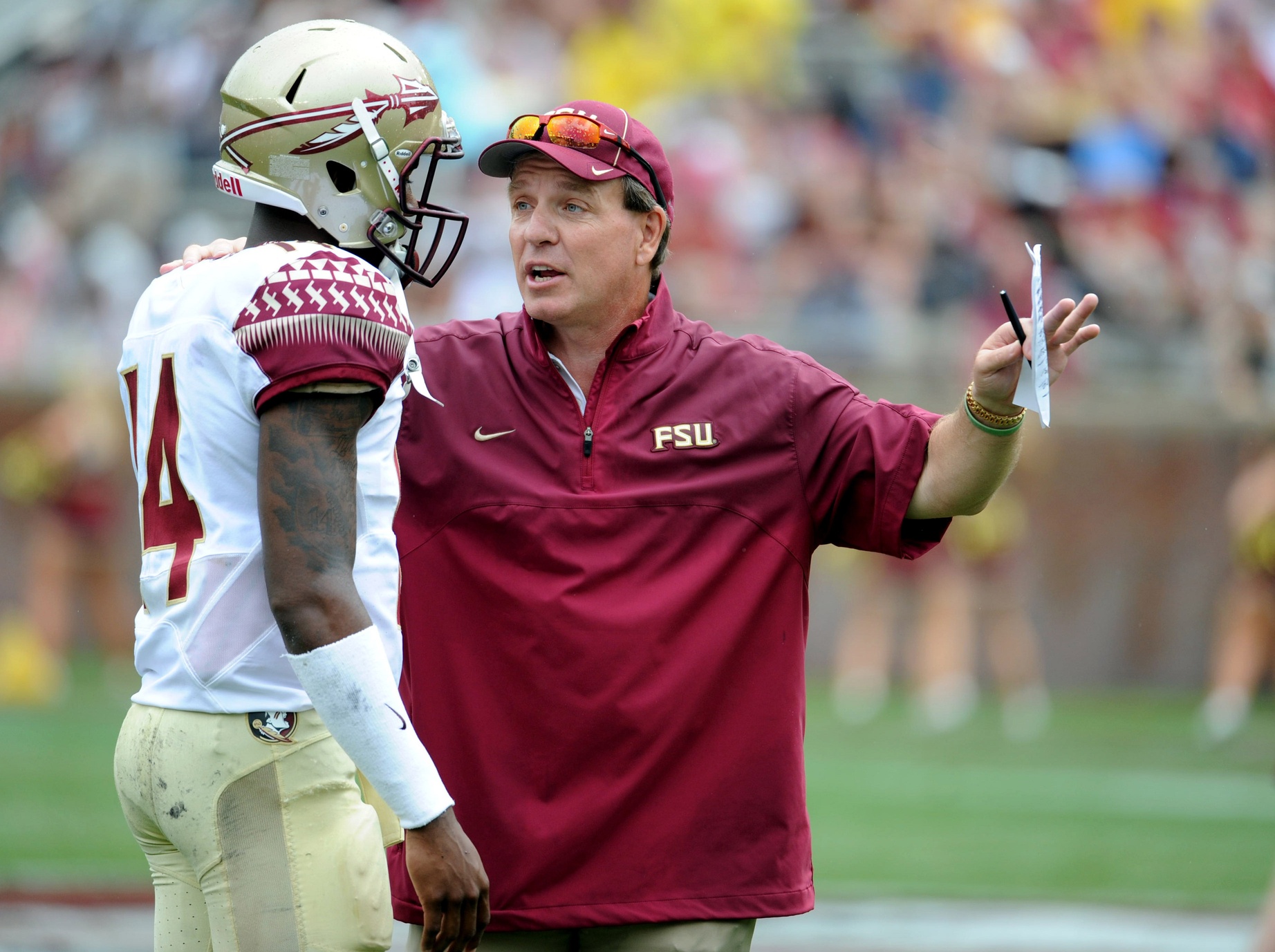 Apr 11, 2015; Tallahassee, FL, USA; Florida State Seminoles head coach Jimbo Fisher talks to quarterback De'Andre Johnson (14) during the spring game at Doak Campbell Stadium. Mandatory Credit: Melina Vastola-USA TODAY Sports