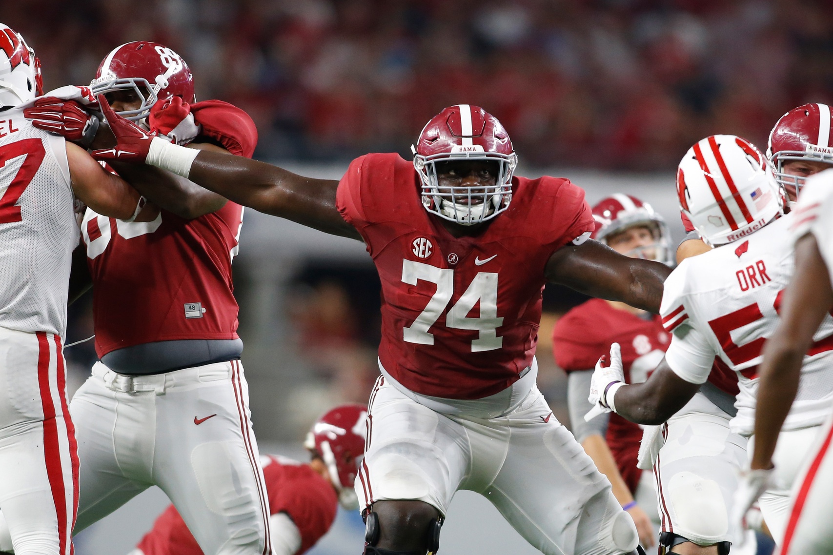 Sep 5, 2015; Arlington, TX, USA; Alabama Crimson Tide offensive lineman Cam Robinson (74) in game action against the Wisconsin Badgers at AT&T Stadium. Alabama won 35-17. Mandatory Credit: Tim Heitman-USA TODAY Sports