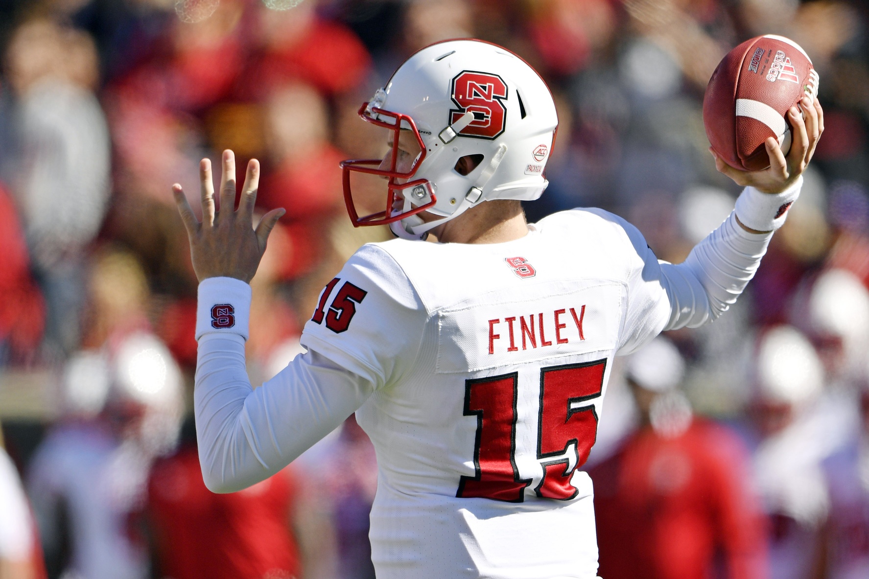 Oct 22, 2016; Louisville, KY, USA; North Carolina State Wolfpack quarterback Ryan Finley (15) looks to pass against the Louisville Cardinals during the second quarter at Papa John's Cardinal Stadium. Mandatory Credit: Jamie Rhodes-USA TODAY Sports