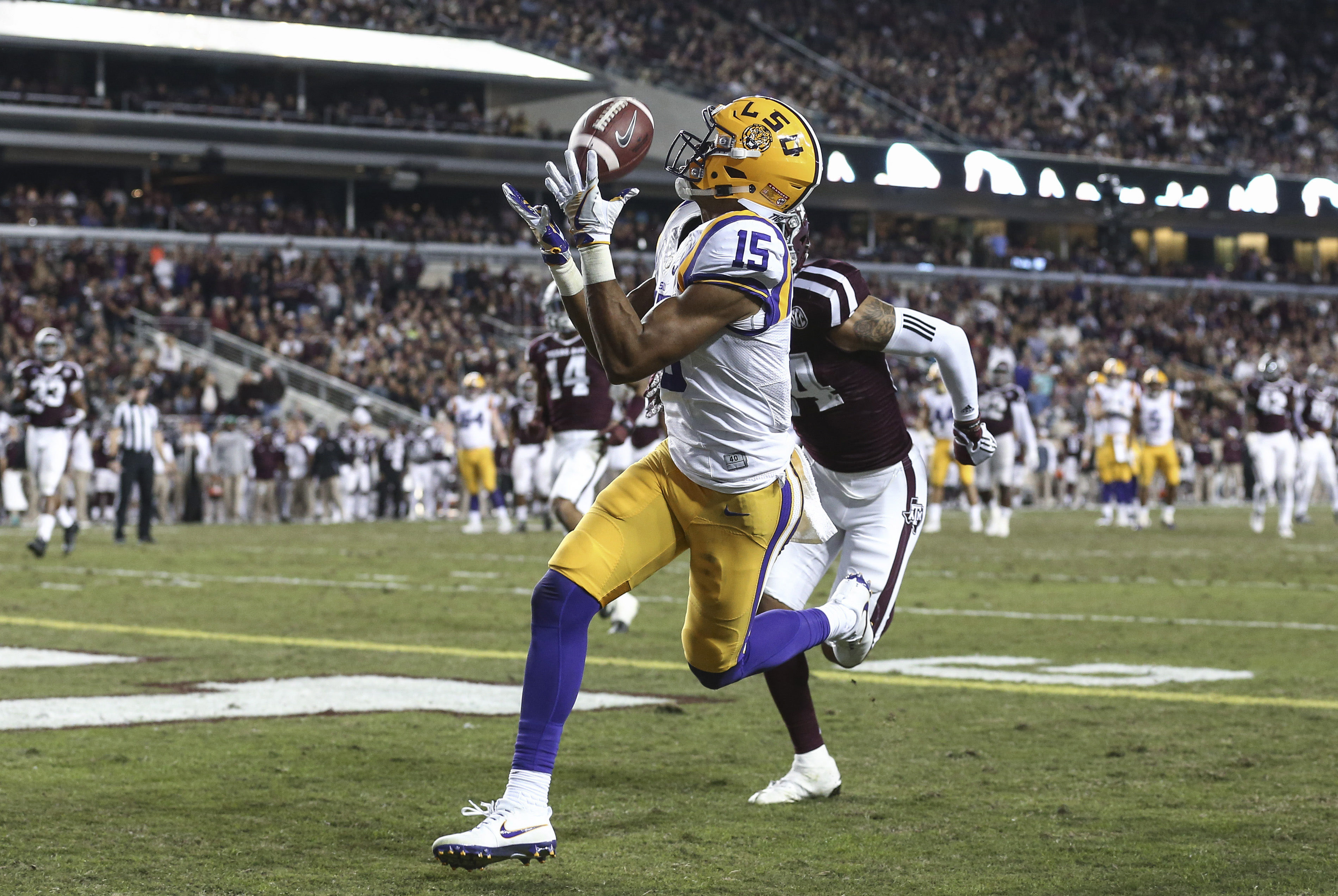 Nov 24, 2016; College Station, TX, USA; LSU Tigers wide receiver Malachi Dupre (15) makes a touchdown reception during the second quarter against the Texas A&M Aggies at Kyle Field. Mandatory Credit: Troy Taormina-USA TODAY Sports