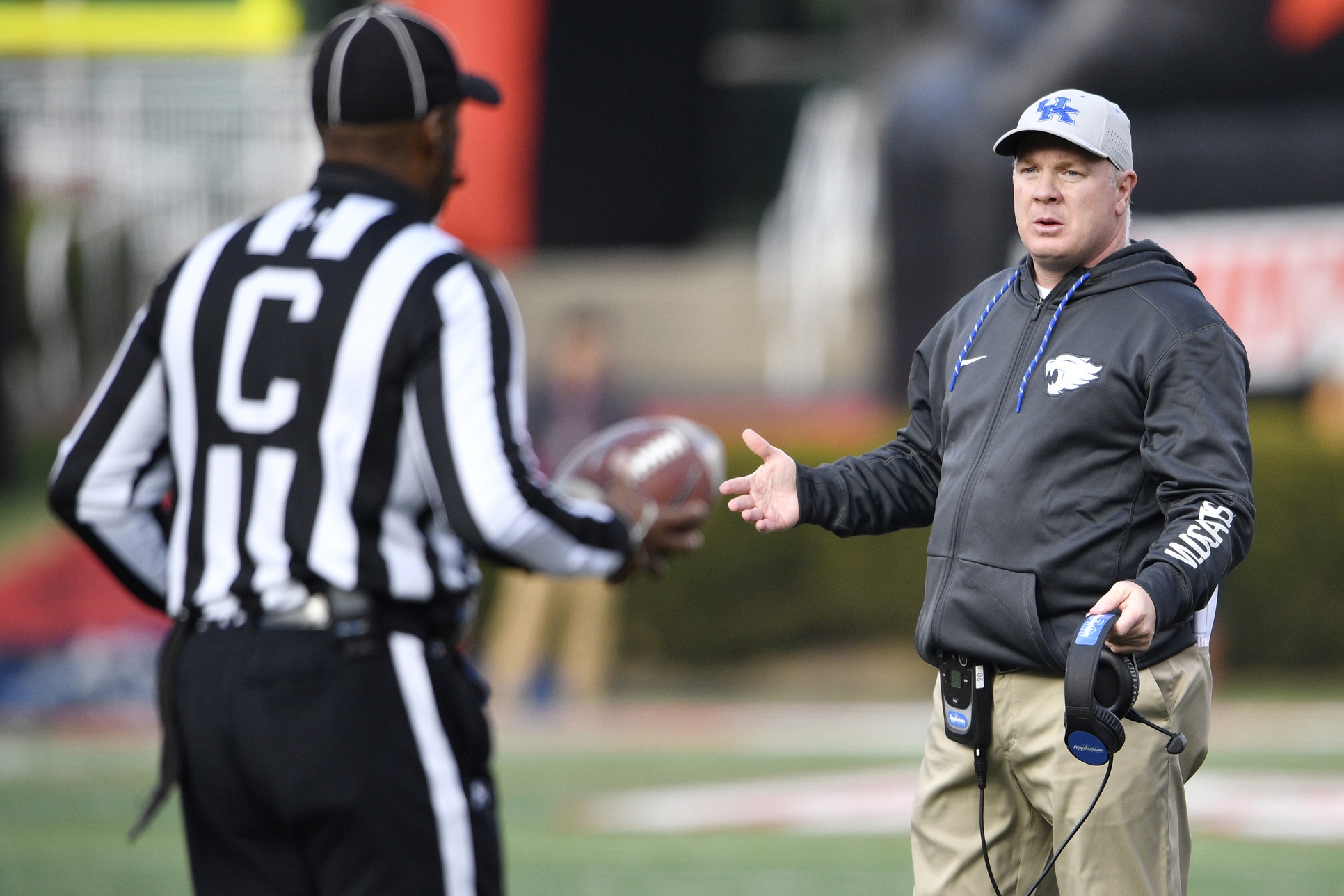 Nov 26, 2016; Louisville, KY, USA; Kentucky Wildcats head coach Mark Stoops questions a call during the second half against the Louisville Cardinals at Papa John's Cardinal Stadium. Kentucky defeated Louisville 41-38. Mandatory Credit: Jamie Rhodes-USA TODAY Sports