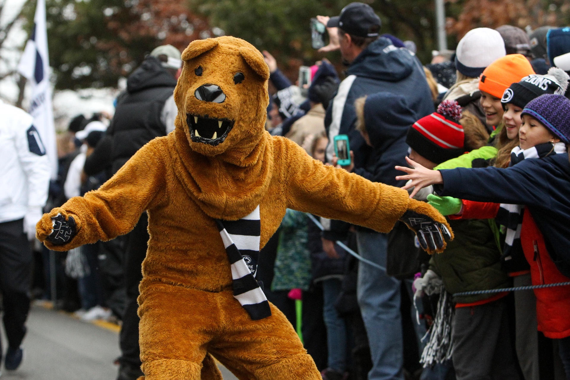 Nov 26, 2016; University Park, PA, USA; The Penn State Nittany Lions mascot shakes hands with fans prior to the game against the Michigan State Spartans at Beaver Stadium. Mandatory Credit: Matthew O'Haren-USA TODAY Sports