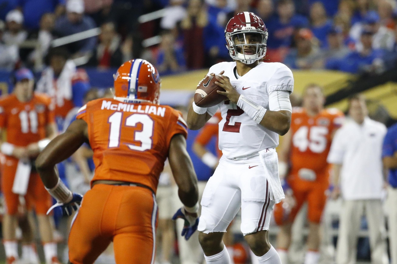 Dec 3, 2016; Atlanta, GA, USA; Alabama Crimson Tide quarterback Jalen Hurts (2) looks to pass as Florida Gators linebacker Daniel McMillian (13) defends during the second quarter of the SEC Championship college football game at Georgia Dome. Mandatory Credit: Jason Getz-USA TODAY Sports