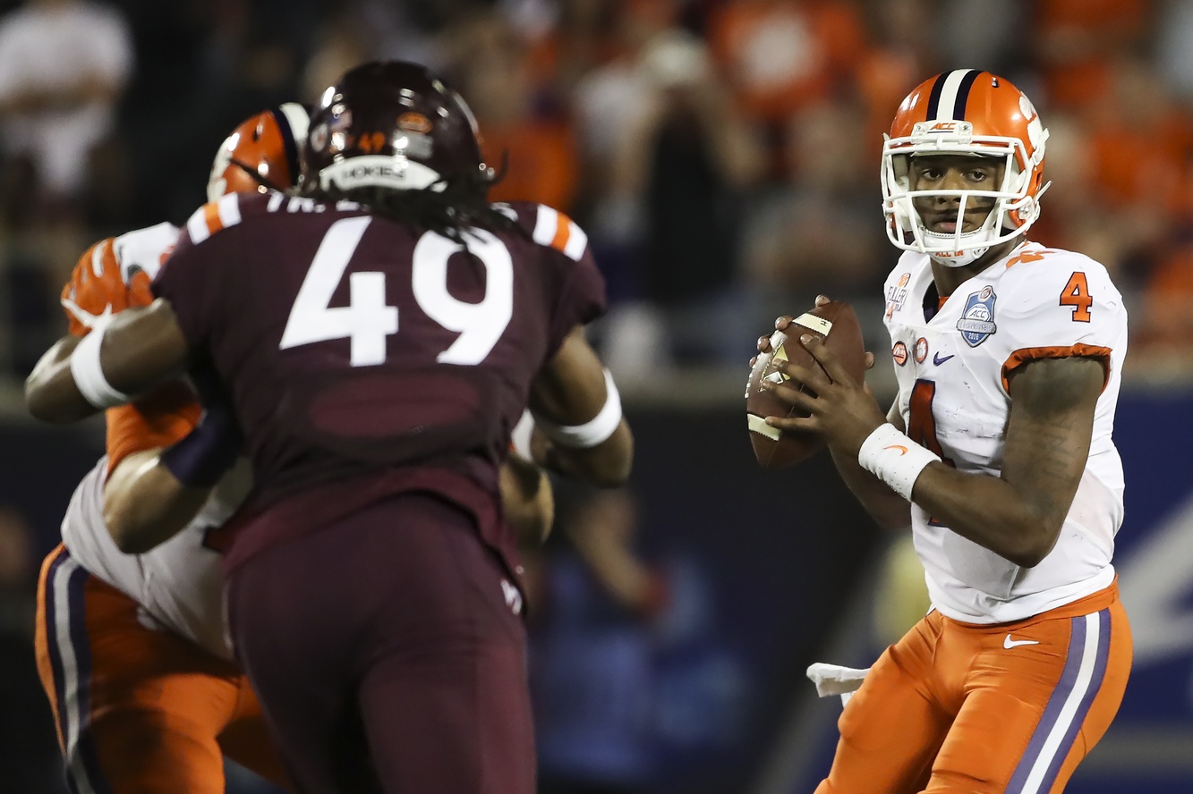 Dec 3, 2016; Orlando, FL, USA; Clemson Tigers quarterback Deshaun Watson (4) looks to pass the ball in the second half against the Virginia Tech Hokies during the ACC Championship college football game at Camping World Stadium. Clemson Tigers won 42-35. Mandatory Credit: Logan Bowles-USA TODAY Sports