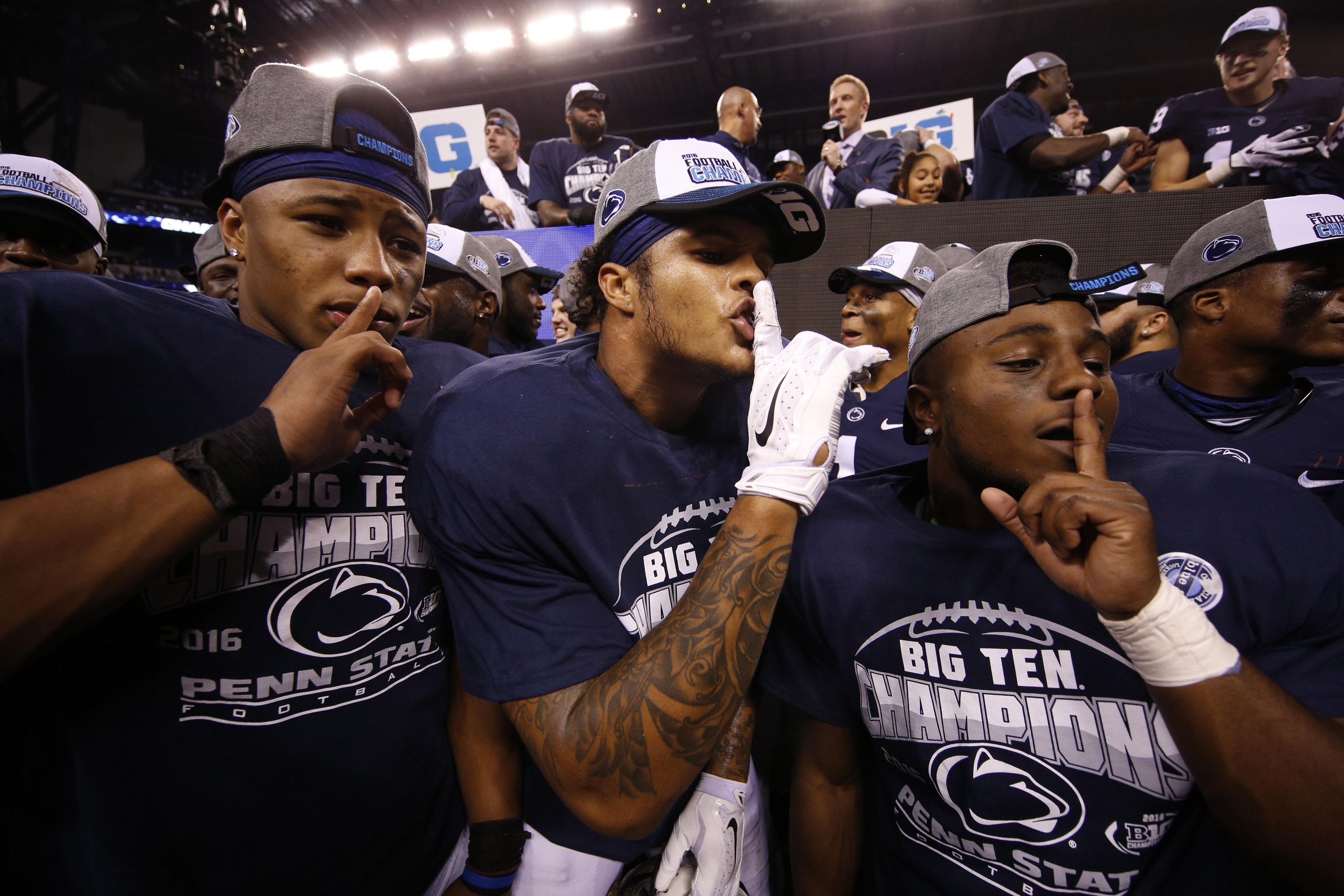 Dec 3, 2016; Indianapolis, IN, USA; Penn State Nittany Lions celebrate after the game against the Wisconsin Badgers during the Big Ten Championship college football game at Lucas Oil Stadium. Penn State defeats Wisconsin 38-31. Mandatory Credit: Brian Spurlock-USA TODAY Sports