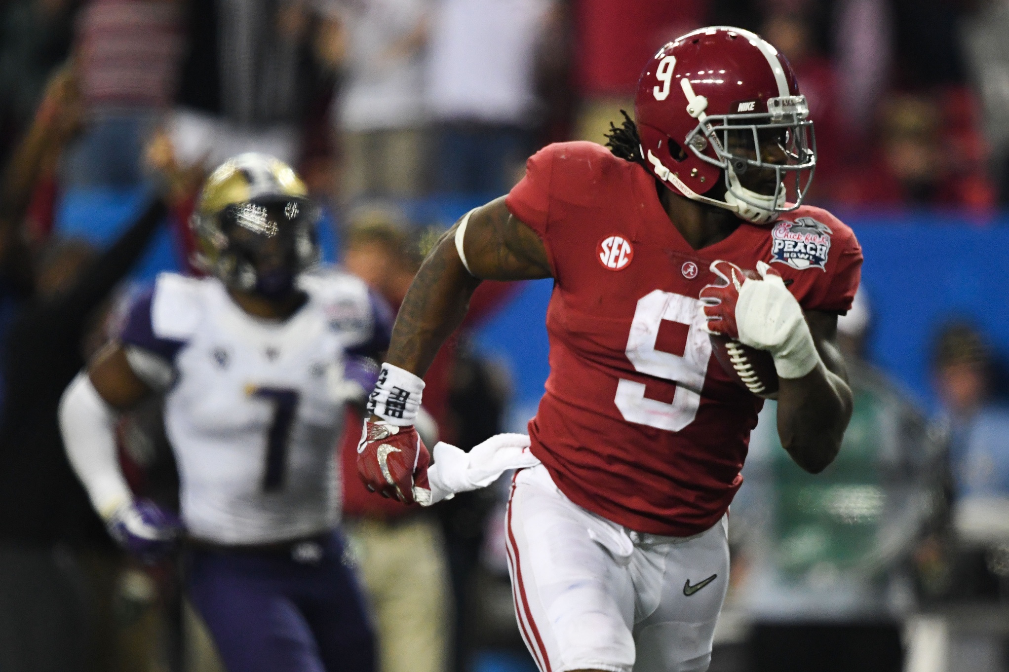 Dec 31, 2016; Atlanta, GA, USA; Alabama Crimson Tide running back Bo Scarbrough (9) scores a touchdown during the fourth quarter in the 2016 CFP Semifinal at the Georgia Dome. Mandatory Credit: RVR Photos-USA TODAY Sports