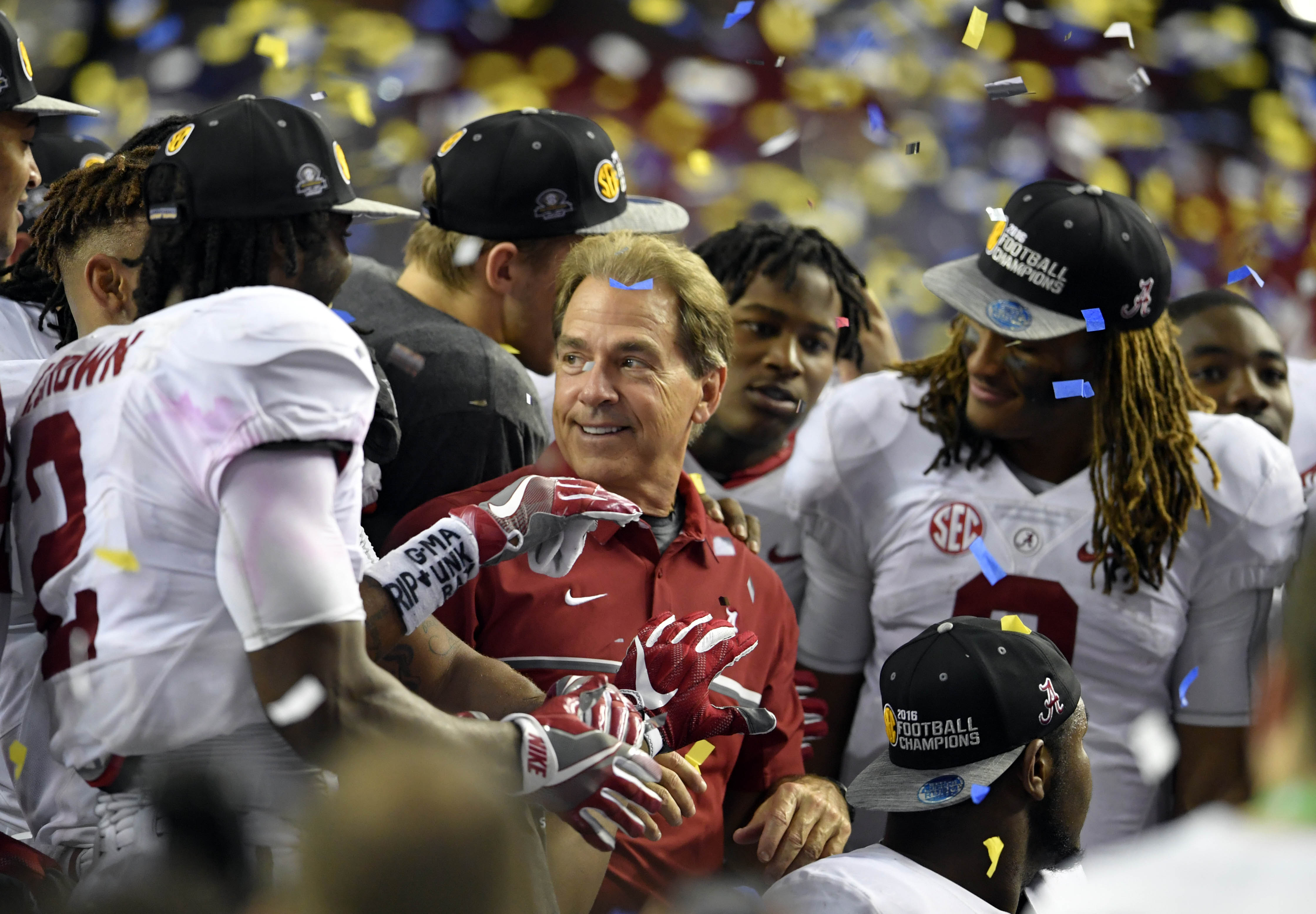 Dec 3, 2016; Atlanta, GA, USA; Alabama Crimson Tide head coach Nick Saban celebrates with his team after the SEC Championship college football game against the Florida Gators at Georgia Dome. Alabama Crimson Tide won 54-16. Mandatory Credit: Dale Zanine-USA TODAY Sports