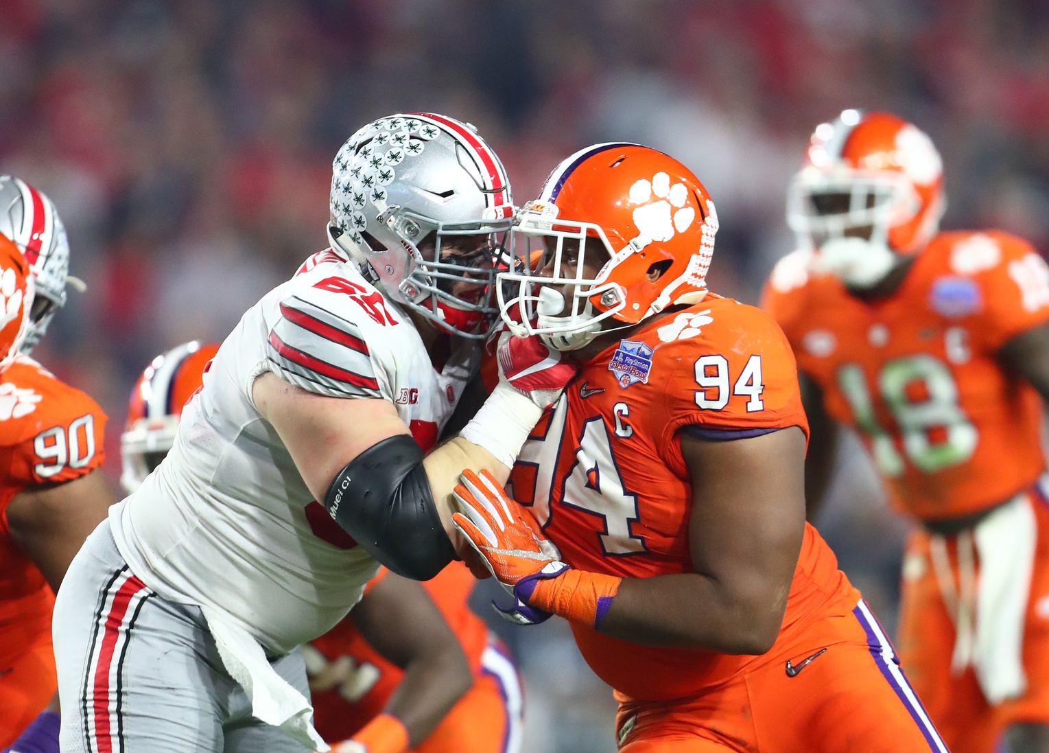 December 31, 2016; Glendale, AZ, USA; Clemson Tigers defensive tackle Carlos Watkins (94) against Ohio State Buckeyes offensive lineman Pat Elflein (65) in the the 2016 CFP semifinal at University of Phoenix Stadium. Mandatory Credit: Mark J. Rebilas-USA TODAY Sports