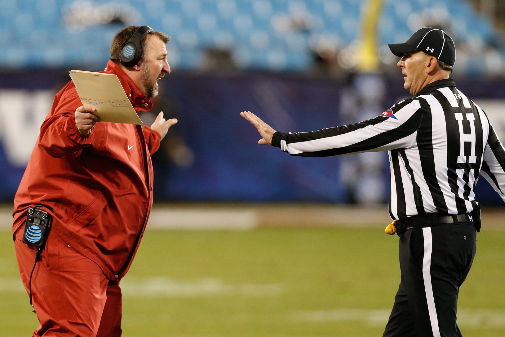 Dec 29, 2016; Charlotte, NC, USA; Arkansas Razorbacks head coach Brett Bielema argues a review in the second quarter against the Virginia Tech Hokies during the Belk Bowl at Bank of America Stadium. Mandatory Credit: Jeremy Brevard-USA TODAY Sports