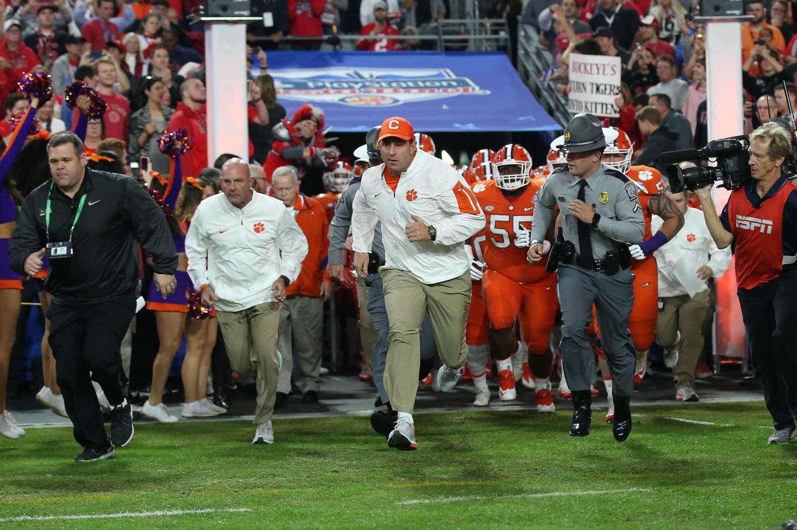 Dec 31, 2016; Glendale, AZ, USA; Clemson Tigers head coach Dabo Swinney leads his team onto the field for the game against the Ohio State Buckeyes at University of Phoenix Stadium. Mandatory Credit: Matthew Emmons-USA TODAY Sports