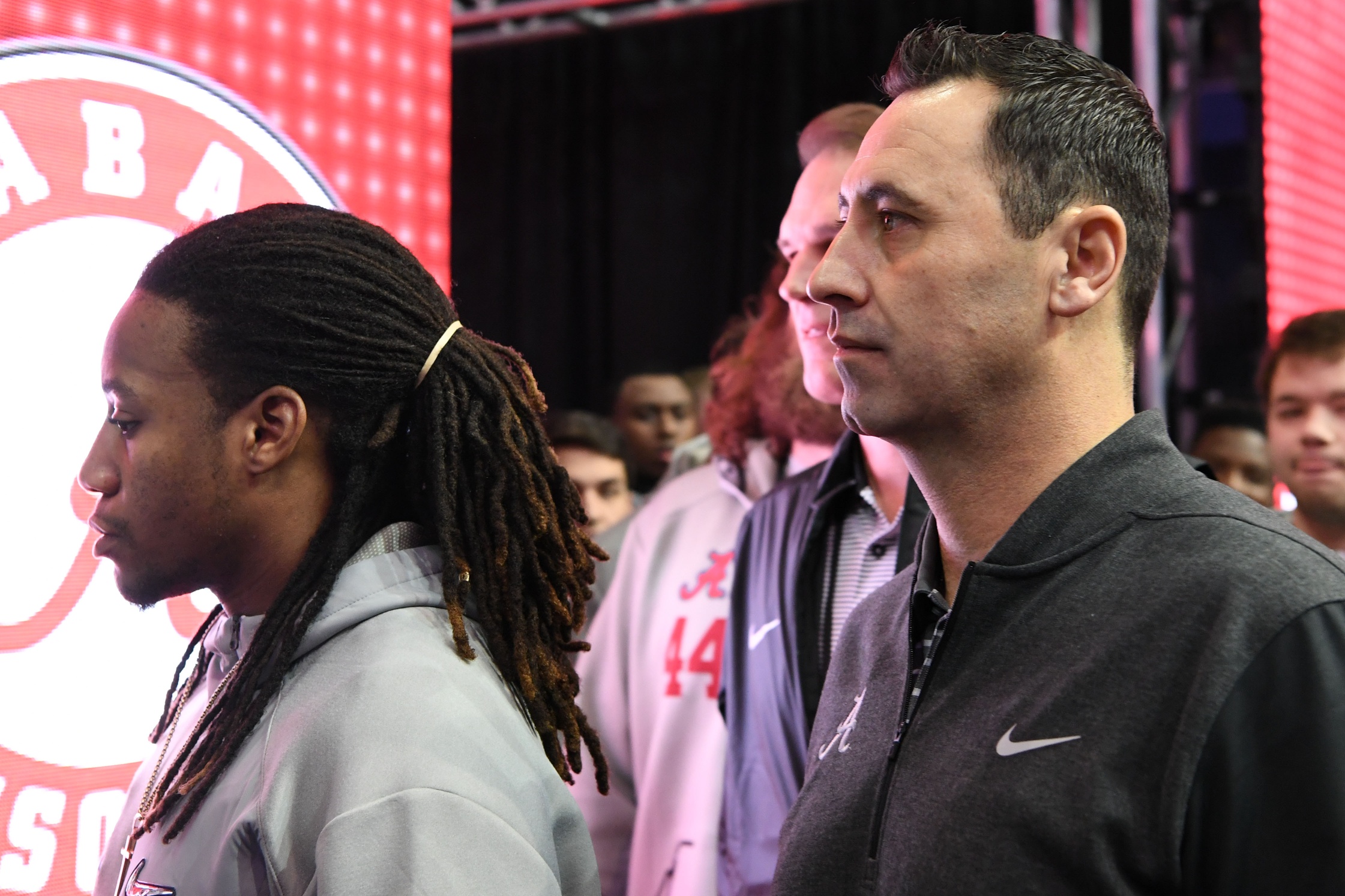 Jan 7, 2017; Tampa, FL, USA; Alabama Crimson Tide offensive coordinator Steve Sarkisian (right) enters the arena for the Alabama Crimson Tide media day at Amalie Arena. Mandatory Credit: John David Mercer-USA TODAY Sports