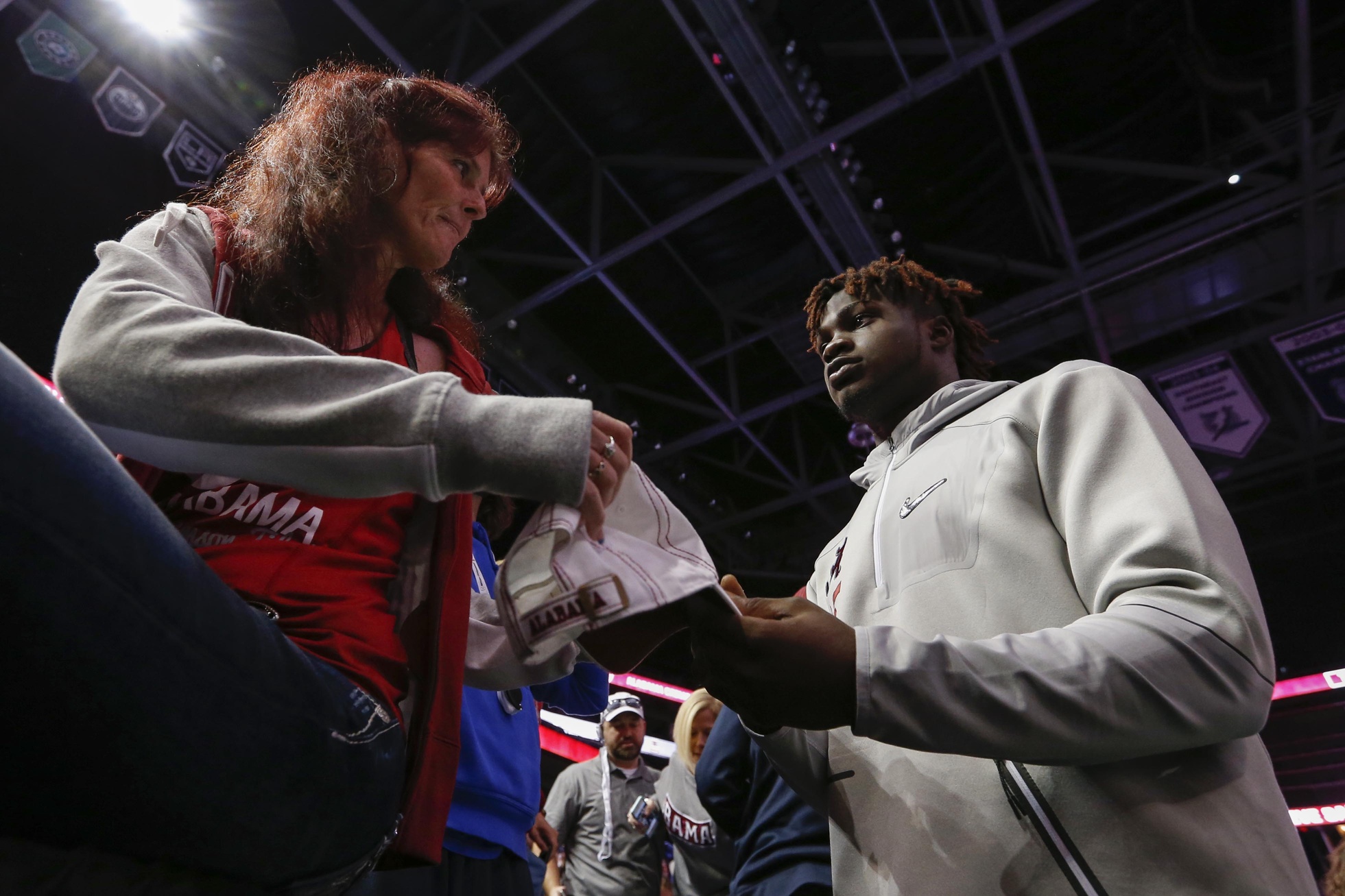 Jan 7, 2017; Tampa, FL, USA; Alabama Crimson Tide defensive back Ronnie Harrison (15) signs autographs during the Alabama Crimson Tide media day at Amalie Arena. Mandatory Credit: Kim Klement-USA TODAY Sports