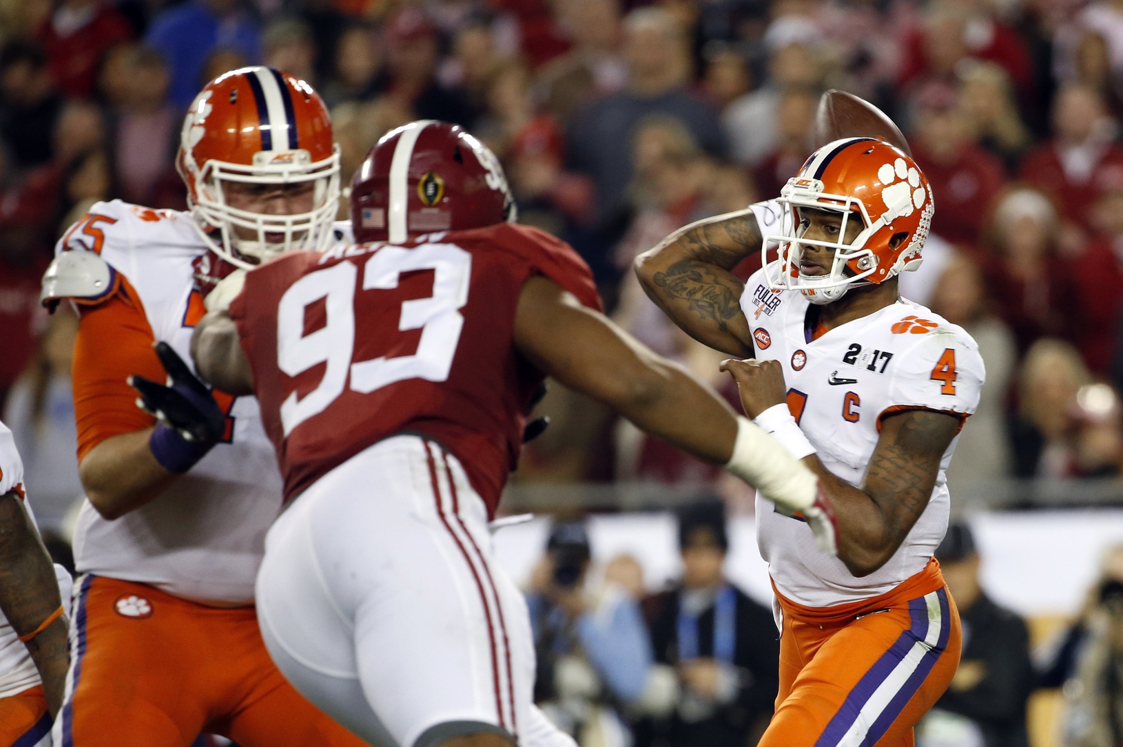 Jan 9, 2017; Tampa, FL, USA; Clemson Tigers quarterback Deshaun Watson (4) throws against Alabama Crimson Tide defensive lineman Jonathan Allen (93) during the second quarter in the 2017 College Football Playoff National Championship Game at Raymond James Stadium. Mandatory Credit: Kim Klement-USA TODAY Sports